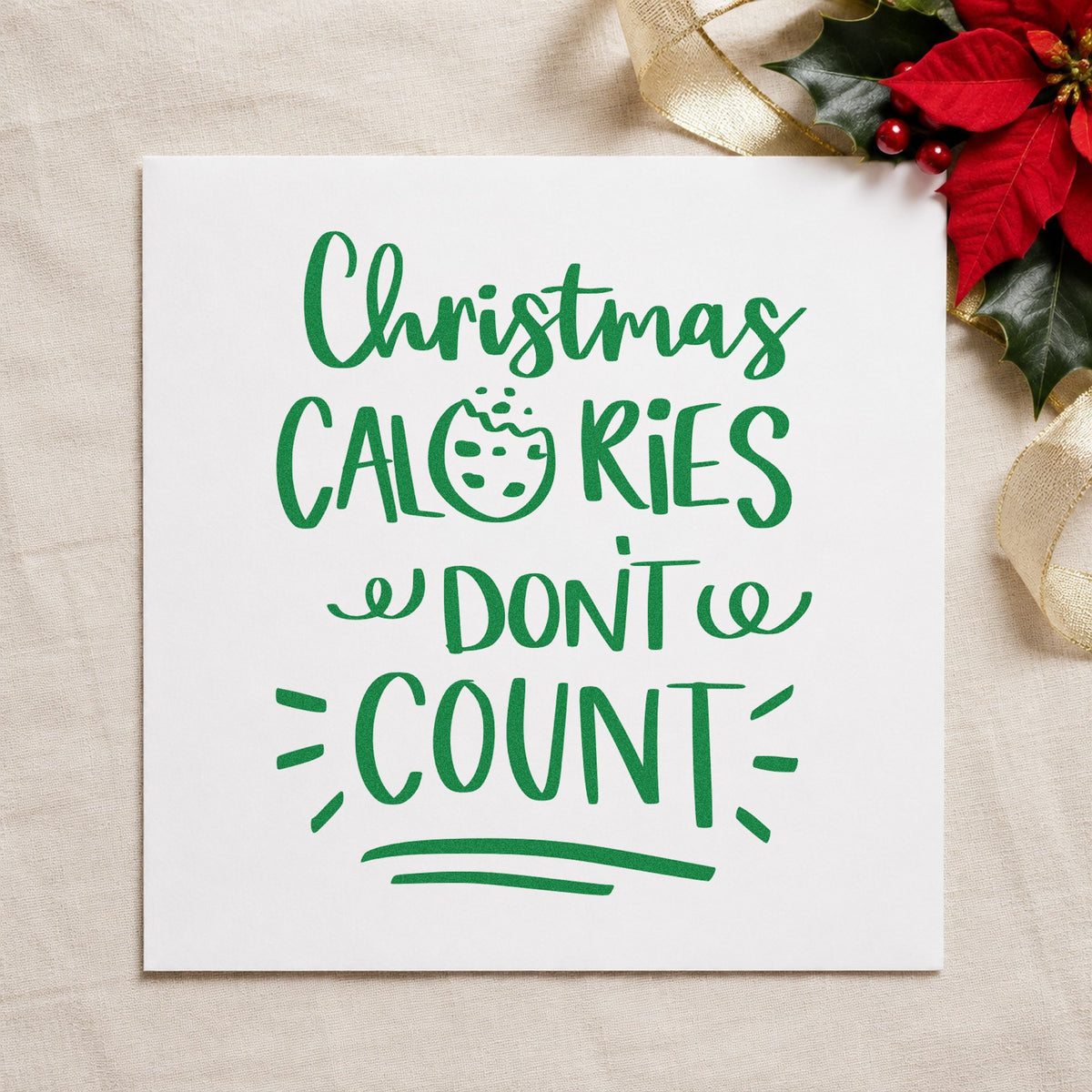 Christmas Calories Don't Count craft stamp imprint in green ink on a handmade project, one idea being single cookie tags.