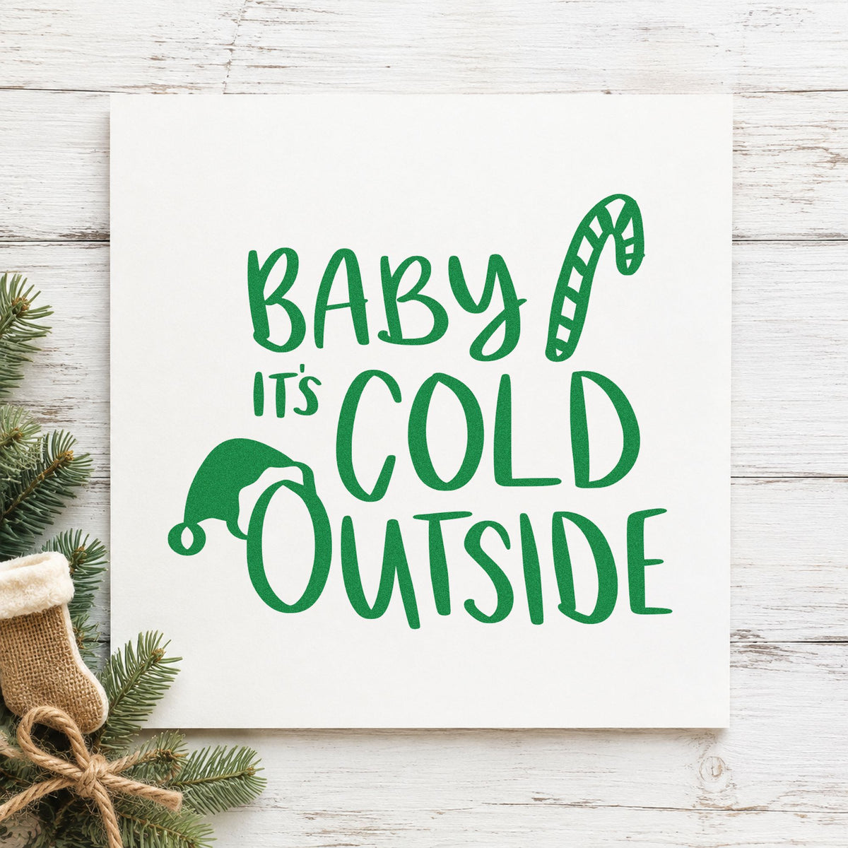 Baby It's Cold Outside Hat craft stamp imprint in green ink on a handmade project, one idea being warm up placards.