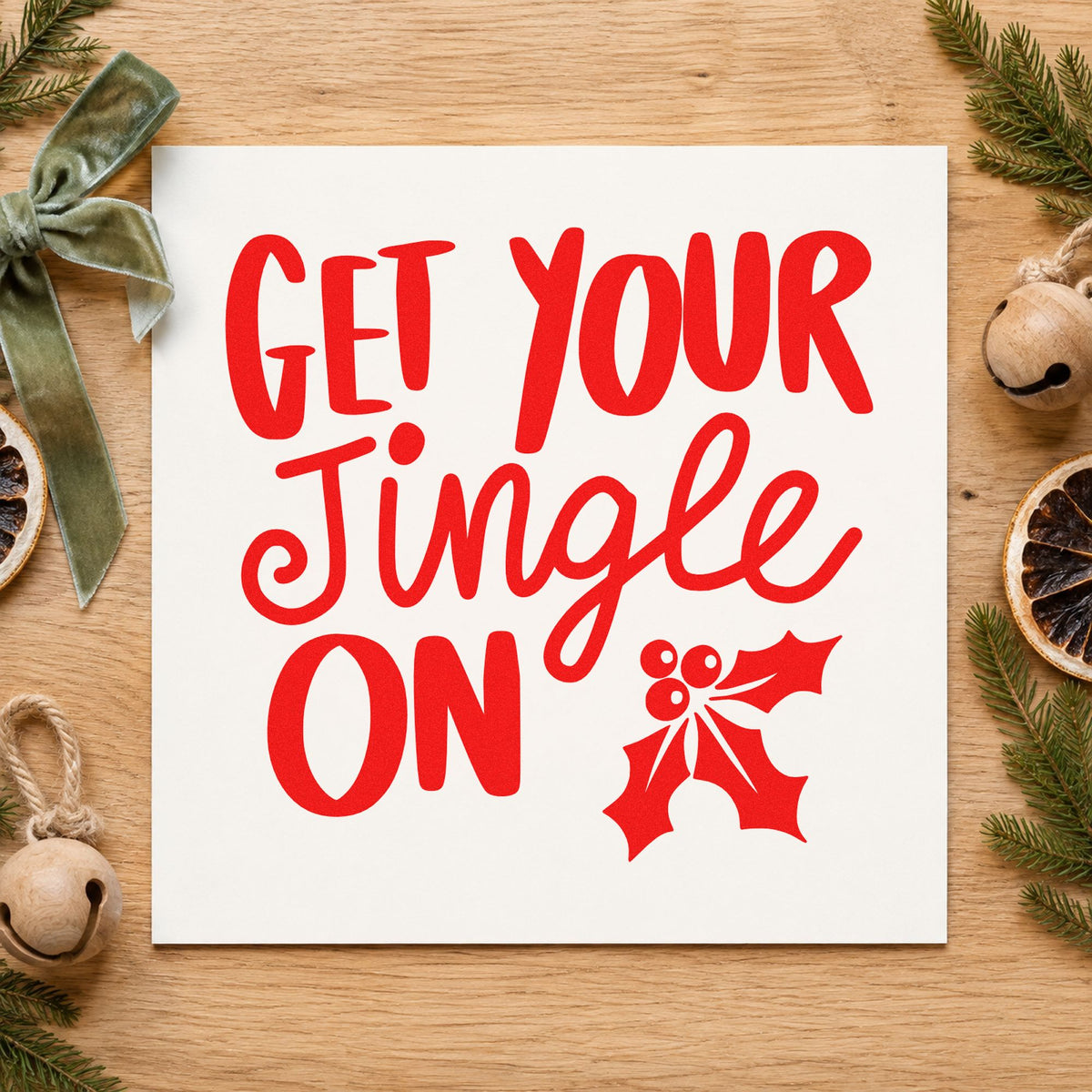 Get Your Jingle On Holly craft stamp in red ink on cardstock, an easy option for staff tee printing.