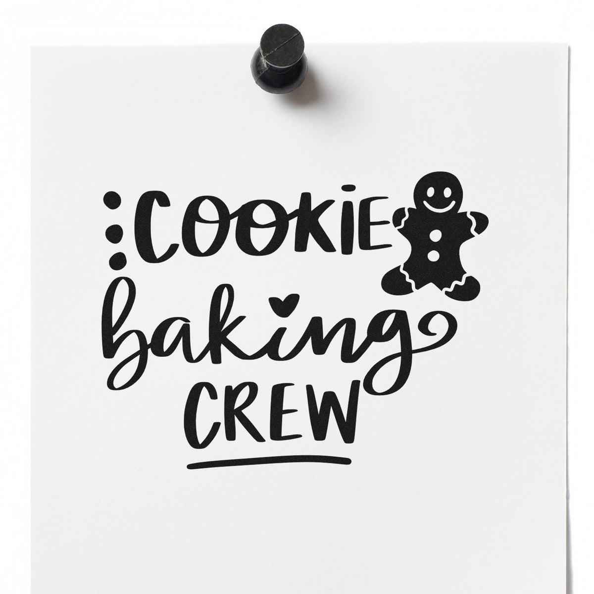 Black cookie baking crew rubber stamp seal with gingerbread man, in black on white paper.