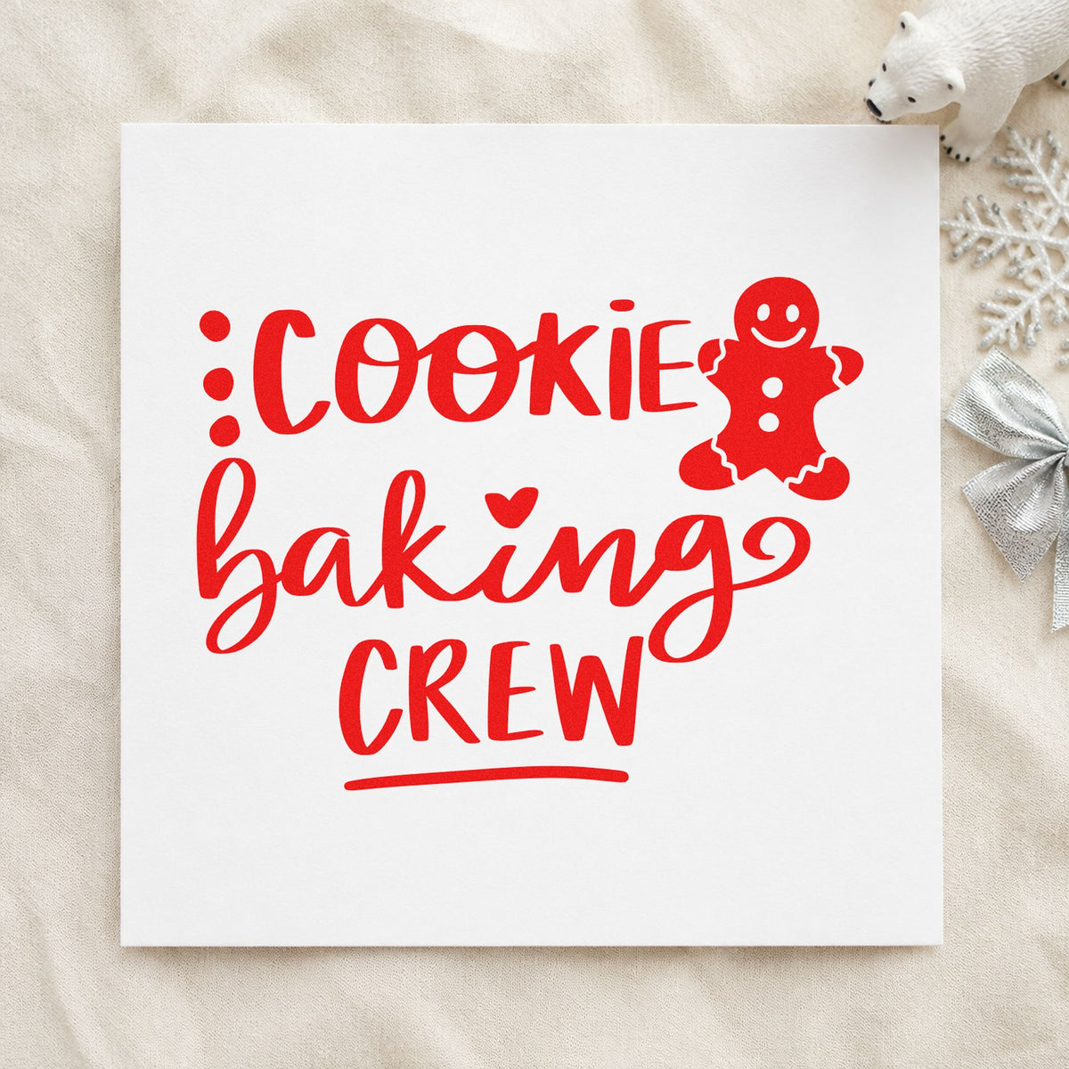 Cookie Baking Crew Gingerbread craft stamp in red ink on cardstock, an easy option for apron hem printing.