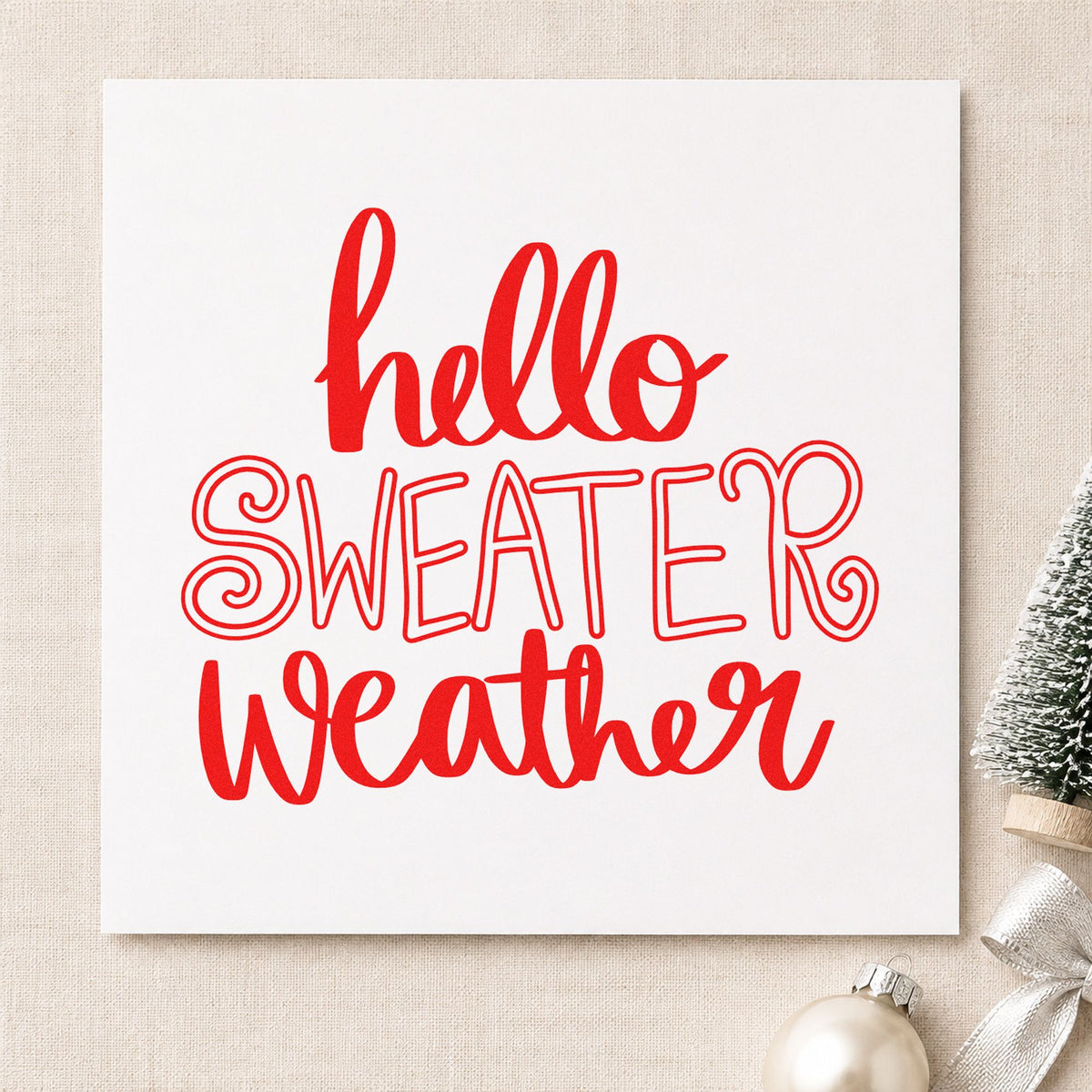 Hello Sweater Weather Lettering rubber stamp shown in red ink, stamped for projects such as marker bin labels.