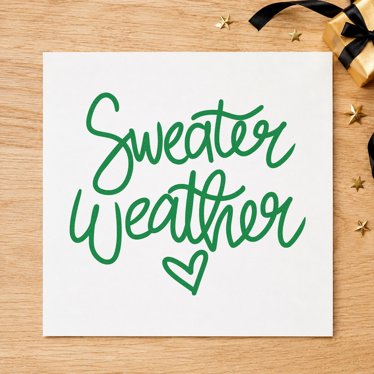 Sweater Weather Little Heart craft stamp imprint in green ink on a handmade project, one idea being swap event cards.