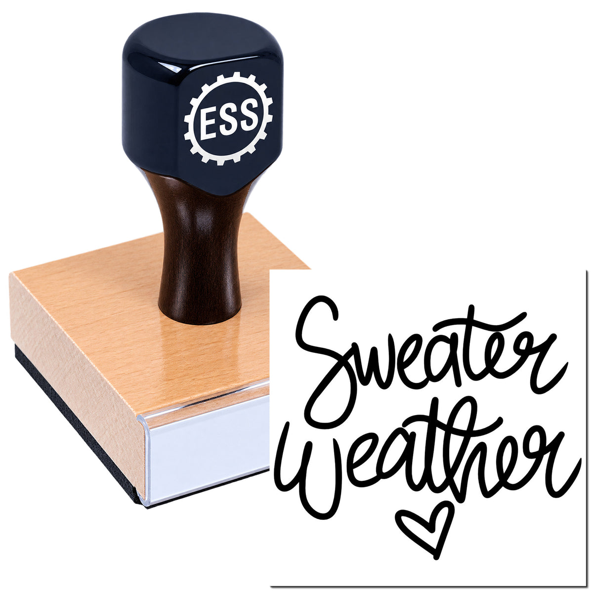 Dark navy ESS rubber stamp on a wood block beside a black "Sweater Weather" seal on white background