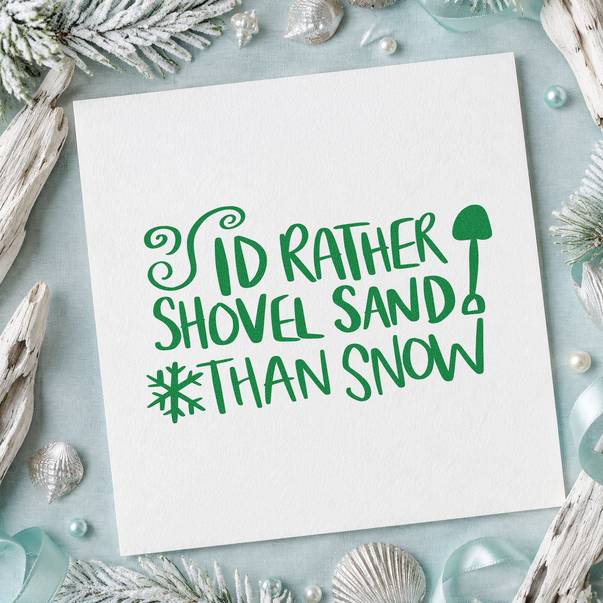Rather Shovel Sand Than Snow craft stamp imprint in green ink on a handmade project, one idea being flight detail cards.
