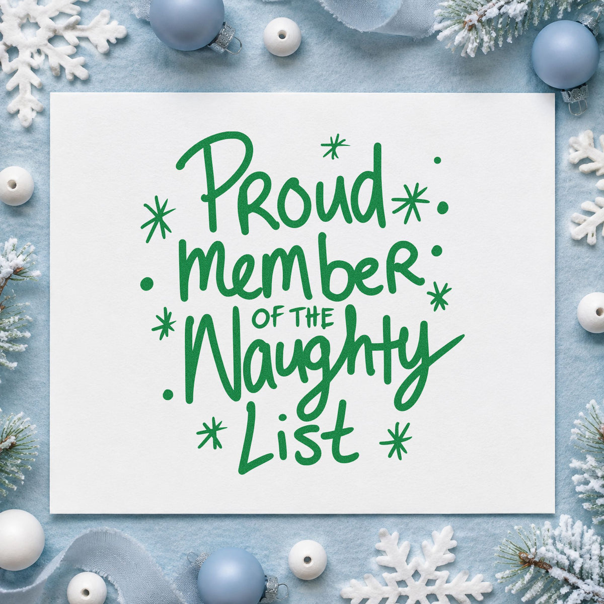 Proud Naughty List Member craft stamp imprint in green ink on a handmade project, one idea being induction slips.