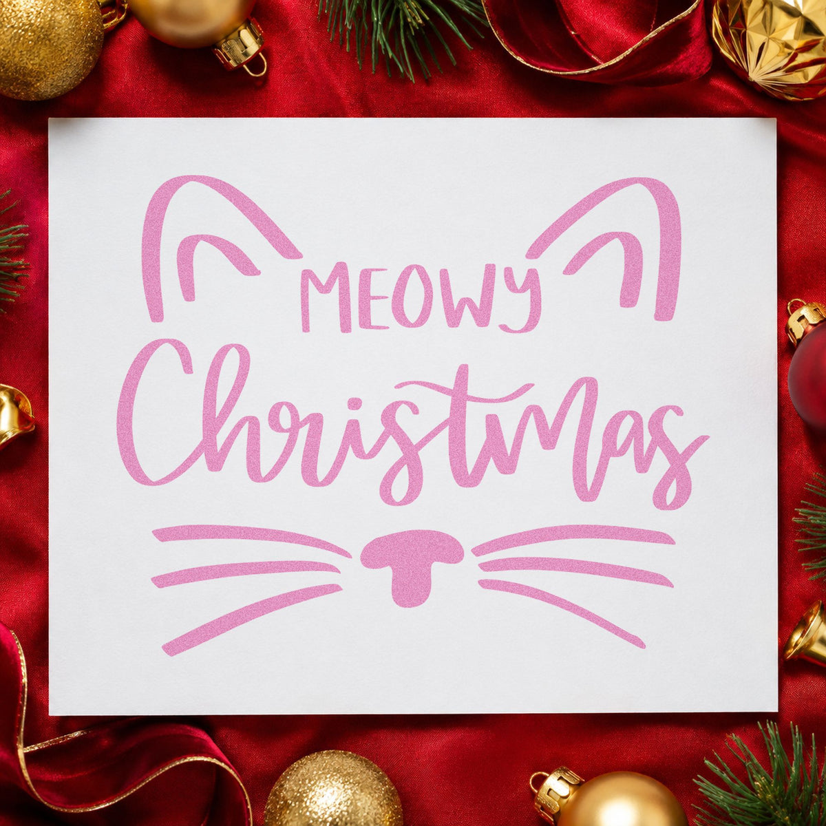 Meowy Christmas Cat Face craft stamp in purple ink on cardstock, an easy option for portrait album page.