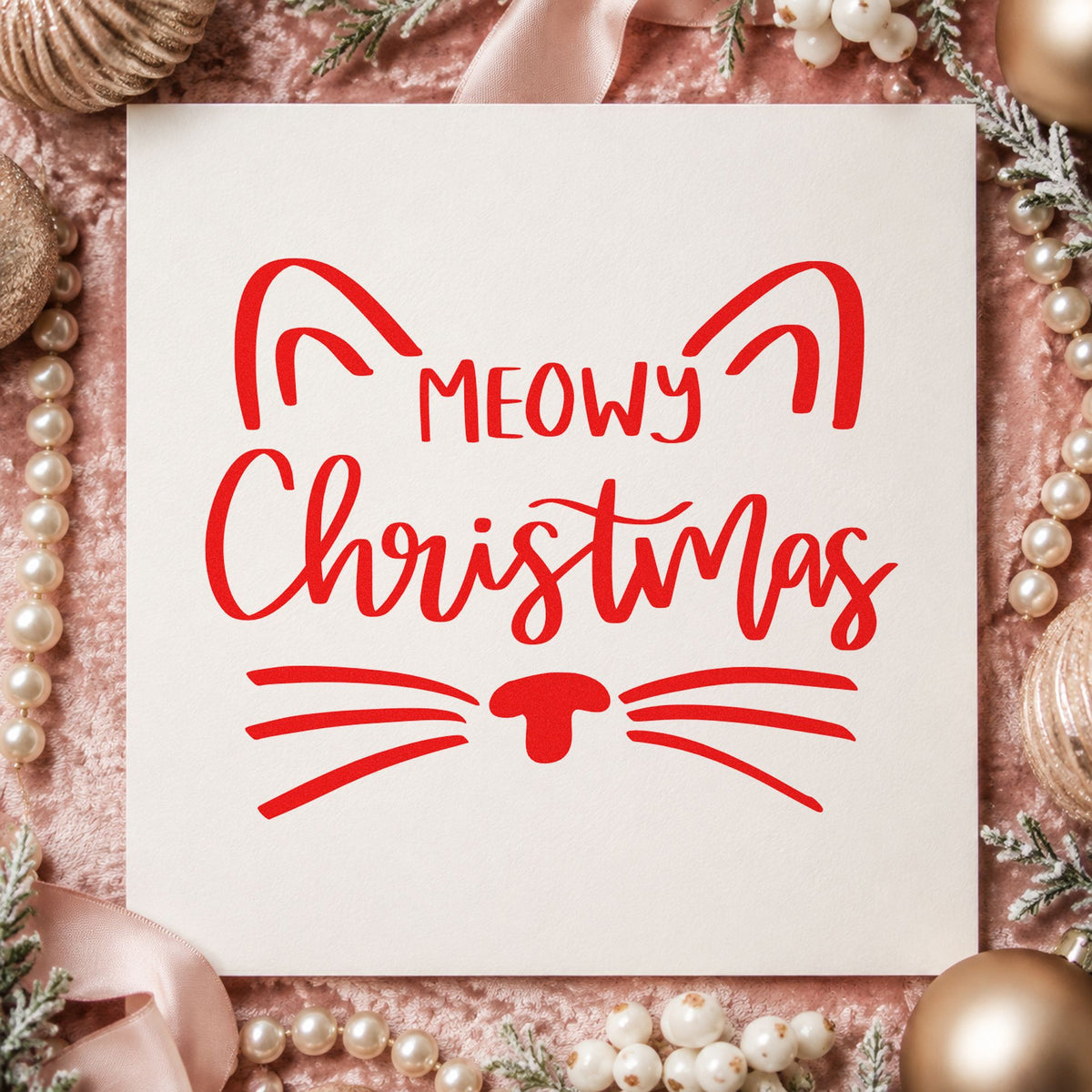 Meowy Christmas Cat Face craft stamp in red ink on cardstock, an easy option for bed cover printing.