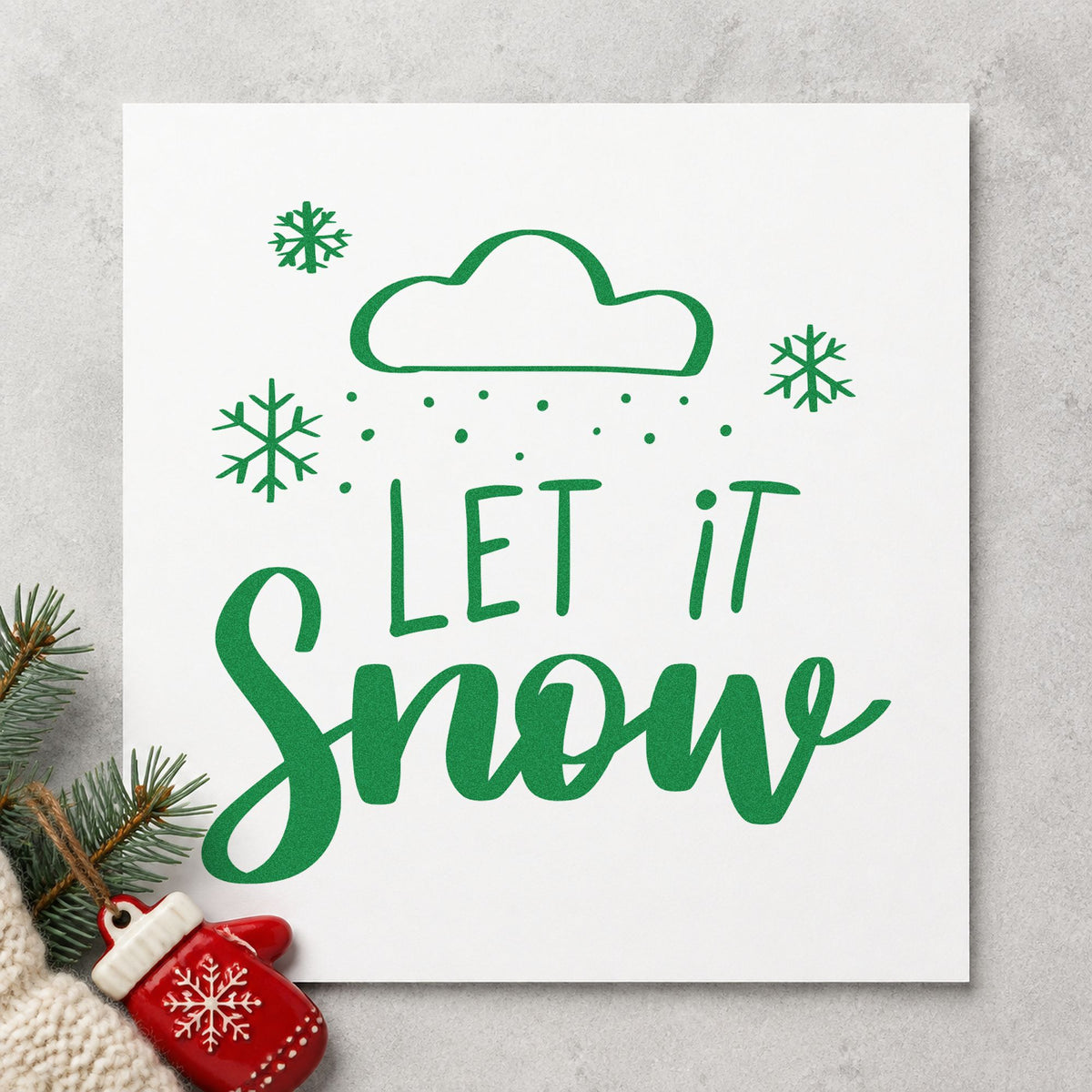 Let It Snow Cloud craft stamp imprint in green ink on a handmade project, one idea being storm watch cards.