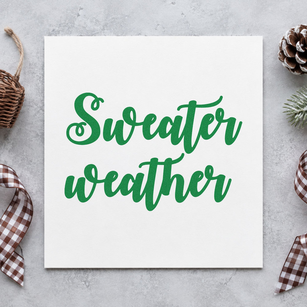 Sweater Weather Brush Script craft stamp imprint in green ink on a handmade project, one idea being thick line gift tags.