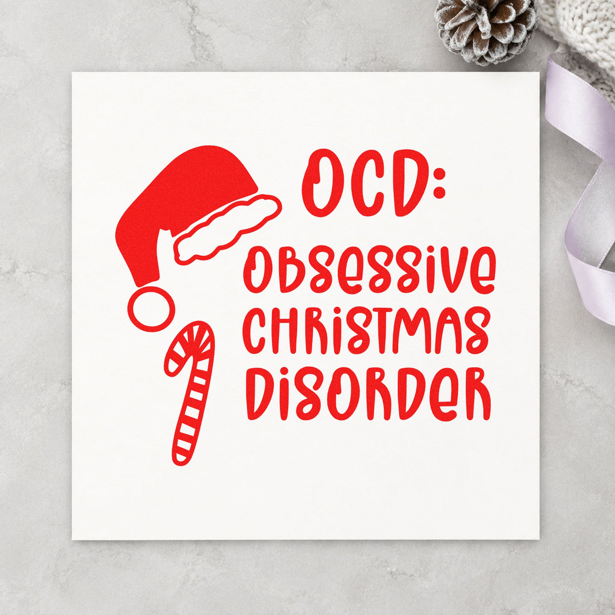 Obsessive Christmas Disorder Hat craft stamp in red ink on cardstock, an easy option for shop tote printing.