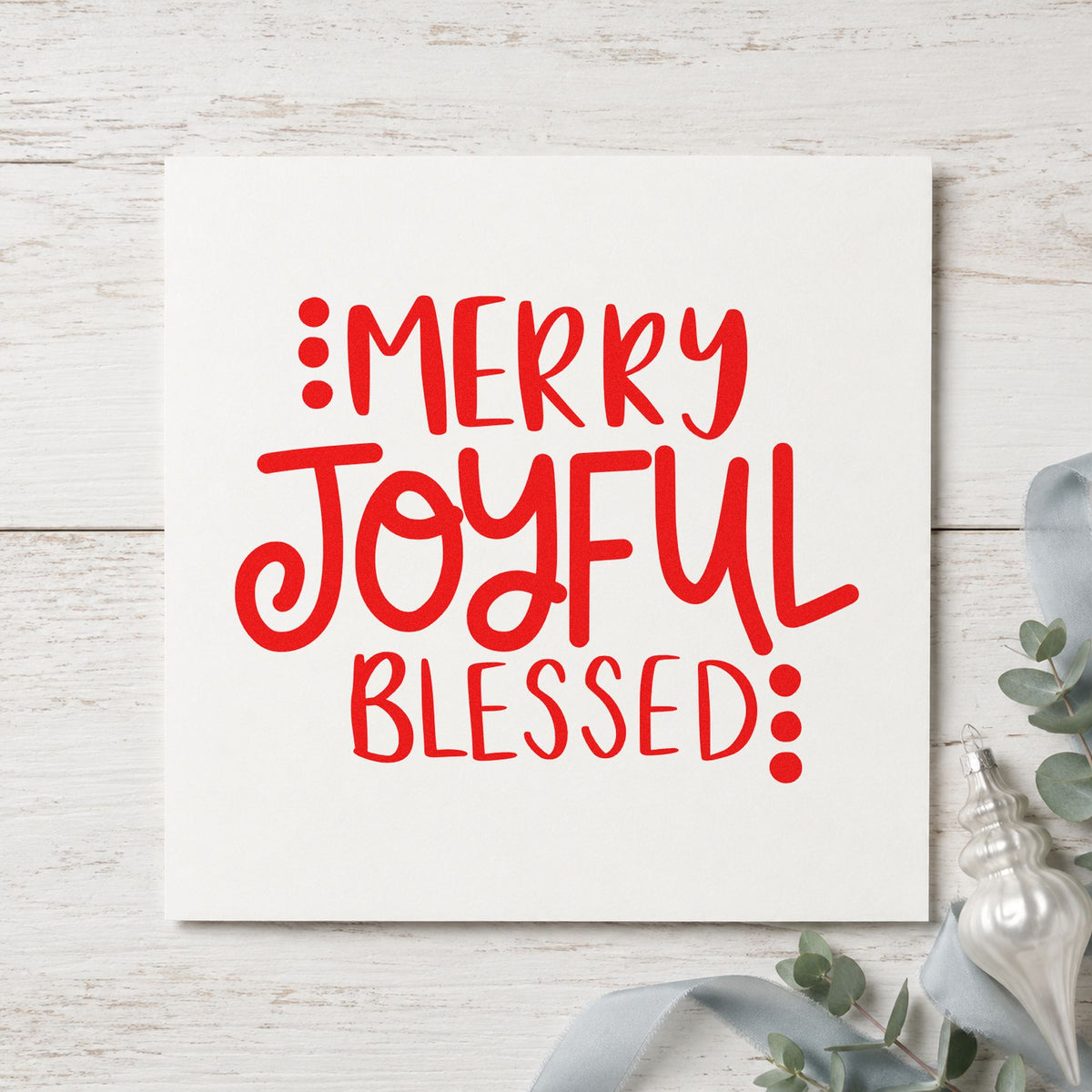 Merry Joyful Blessed Dots craft stamp in red ink on cardstock, an easy option for runner edge printing.