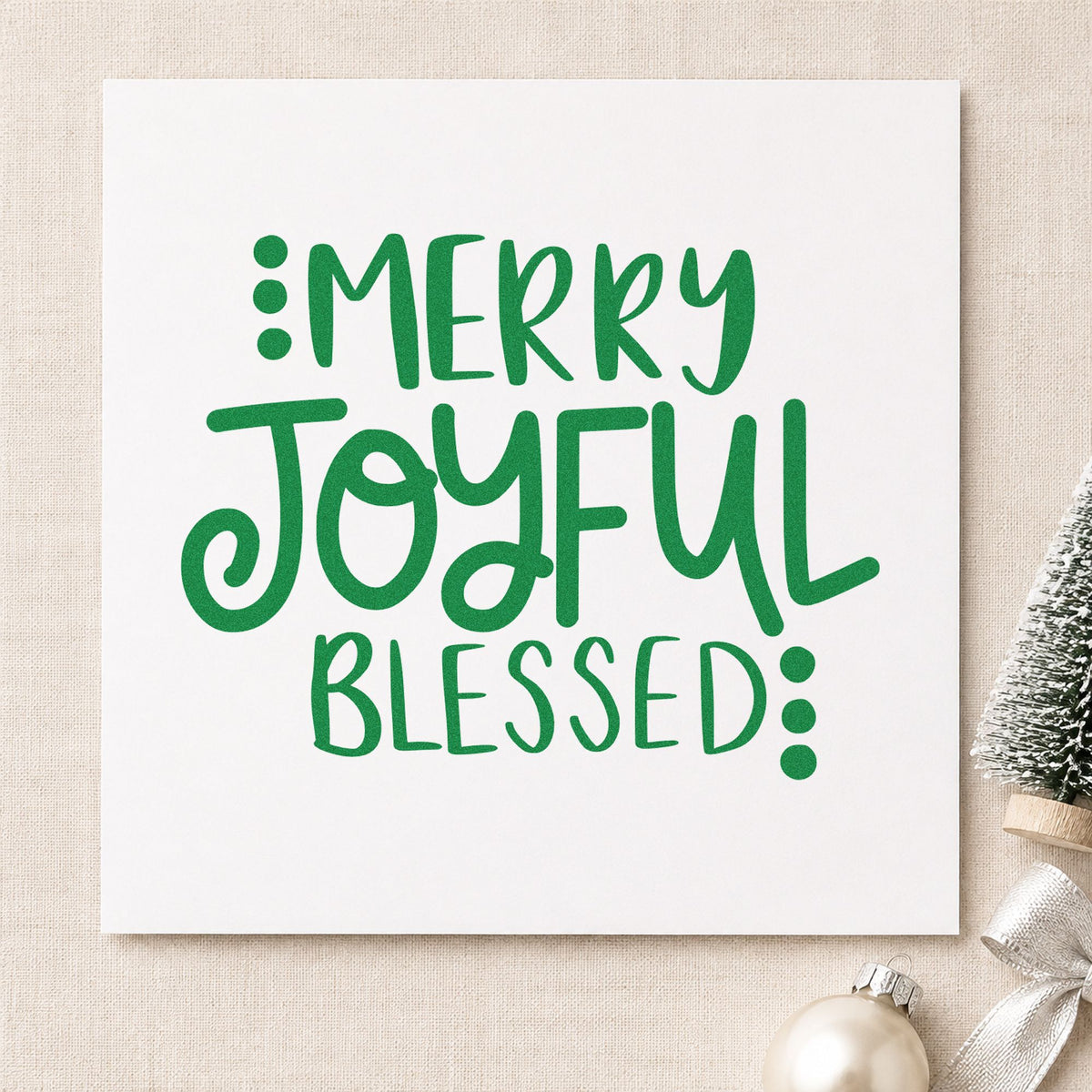 Merry Joyful Blessed Dots craft stamp imprinted in green ink on paper, a design suited to framed double column.