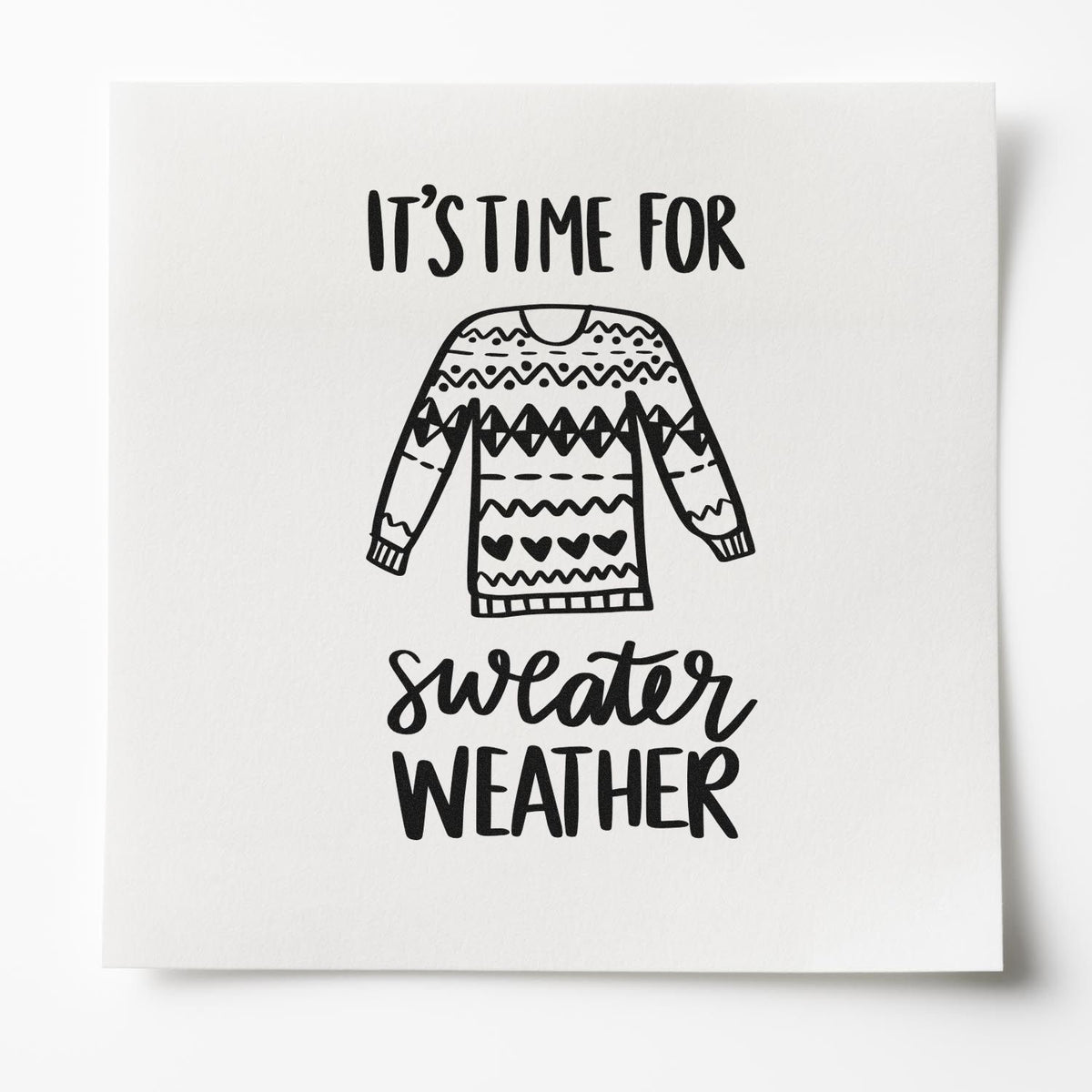 Black sweater stamp and seal design with Its time for sweater weather text on a white background.