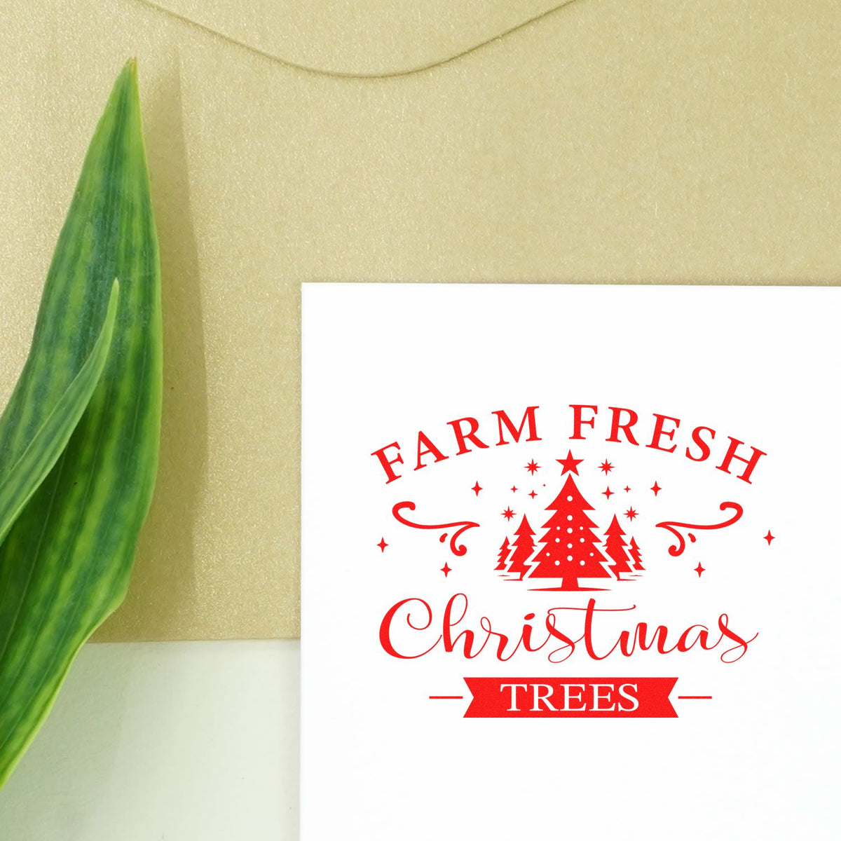 Red Farm Fresh Christmas Trees rubber stamp seal on white card, with festive tree graphic, beige background and green leaf.