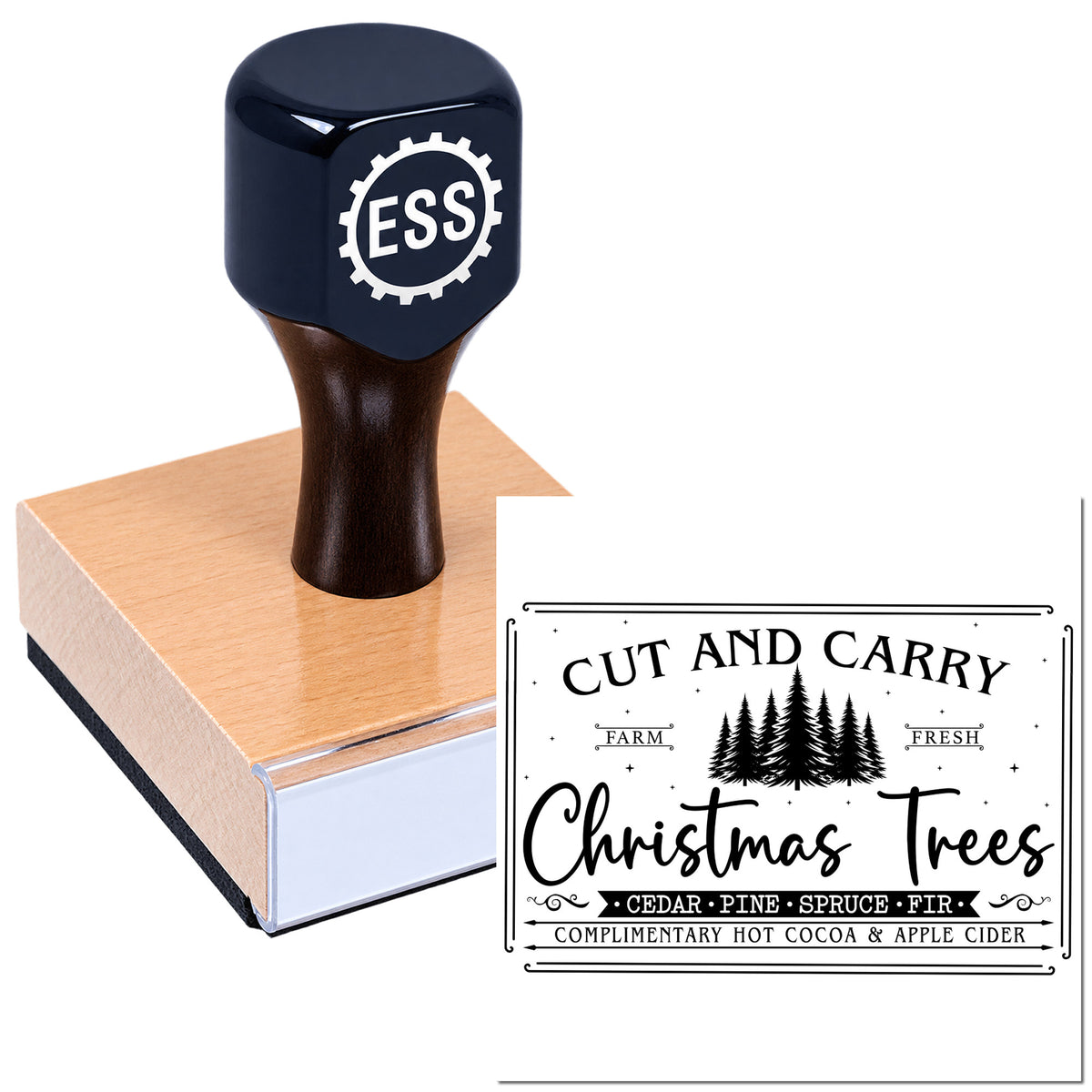 Navy and black rubber stamp with copper base, showing a Cut and Carry Christmas Trees seal in rustic black lettering.