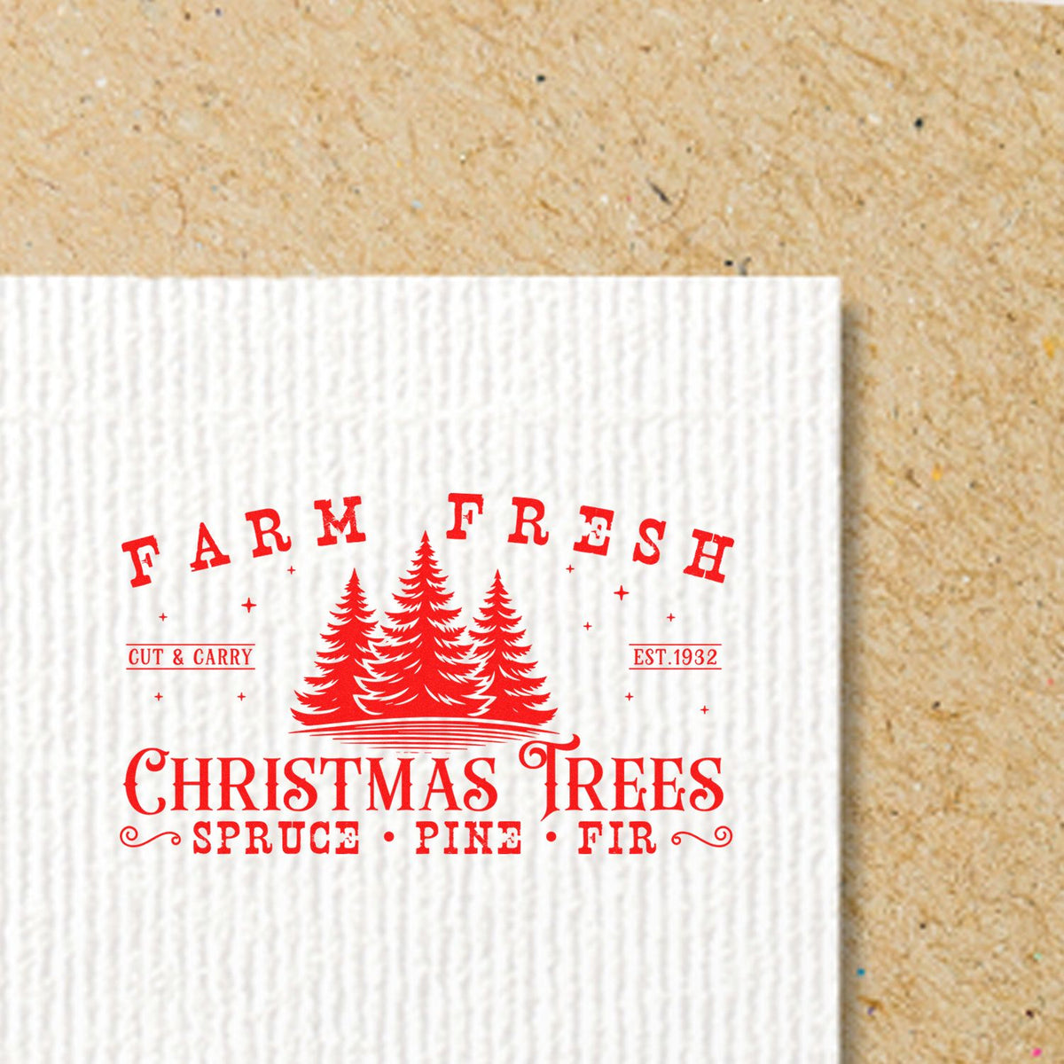 Red farm-fresh Christmas tree stamp seal on white textured card, with pine silhouettes and vintage lettering.