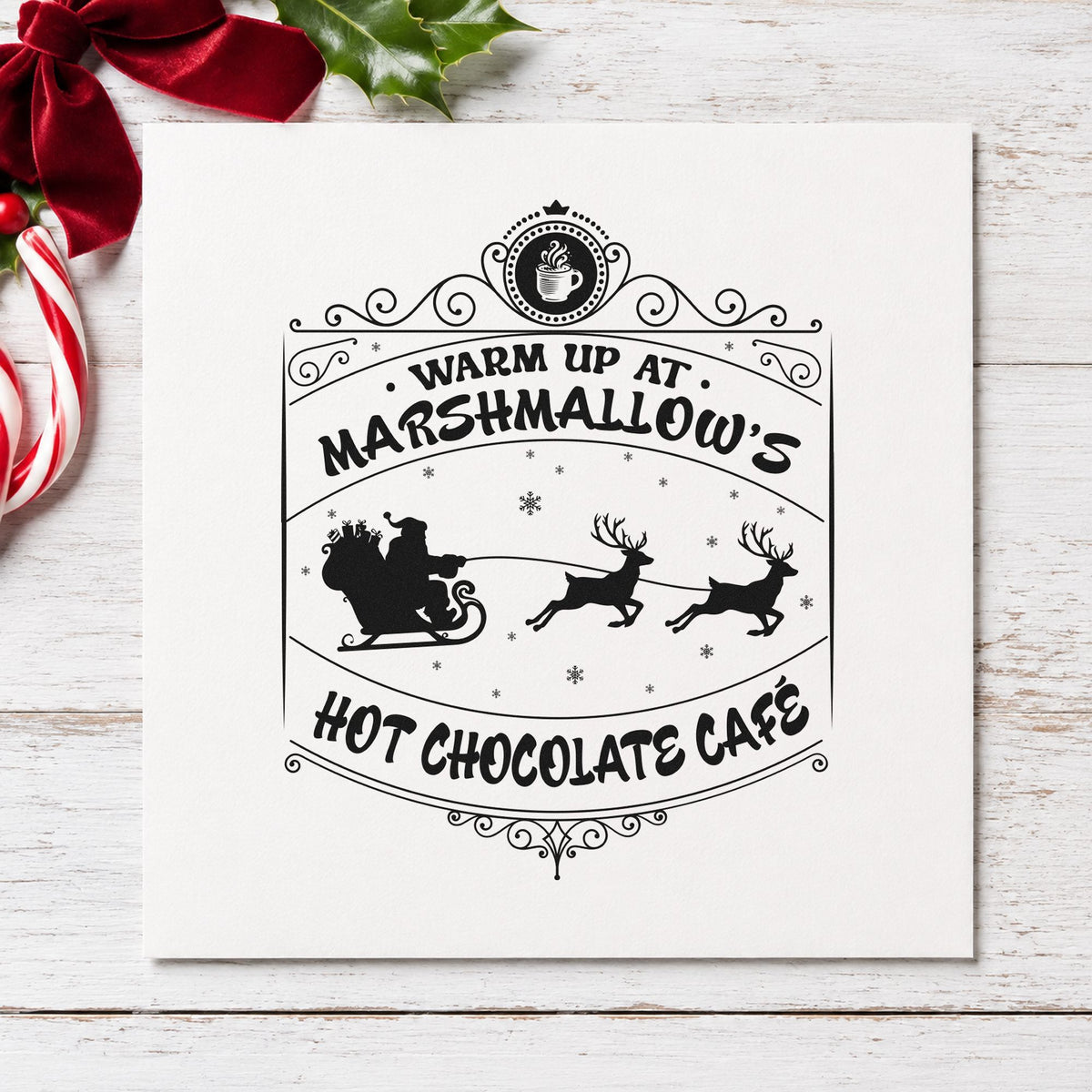 Marshmallow Hot Chocolate Cafe craft stamp imprint in black ink on a handmade project, one idea being takeaway cup tags.
