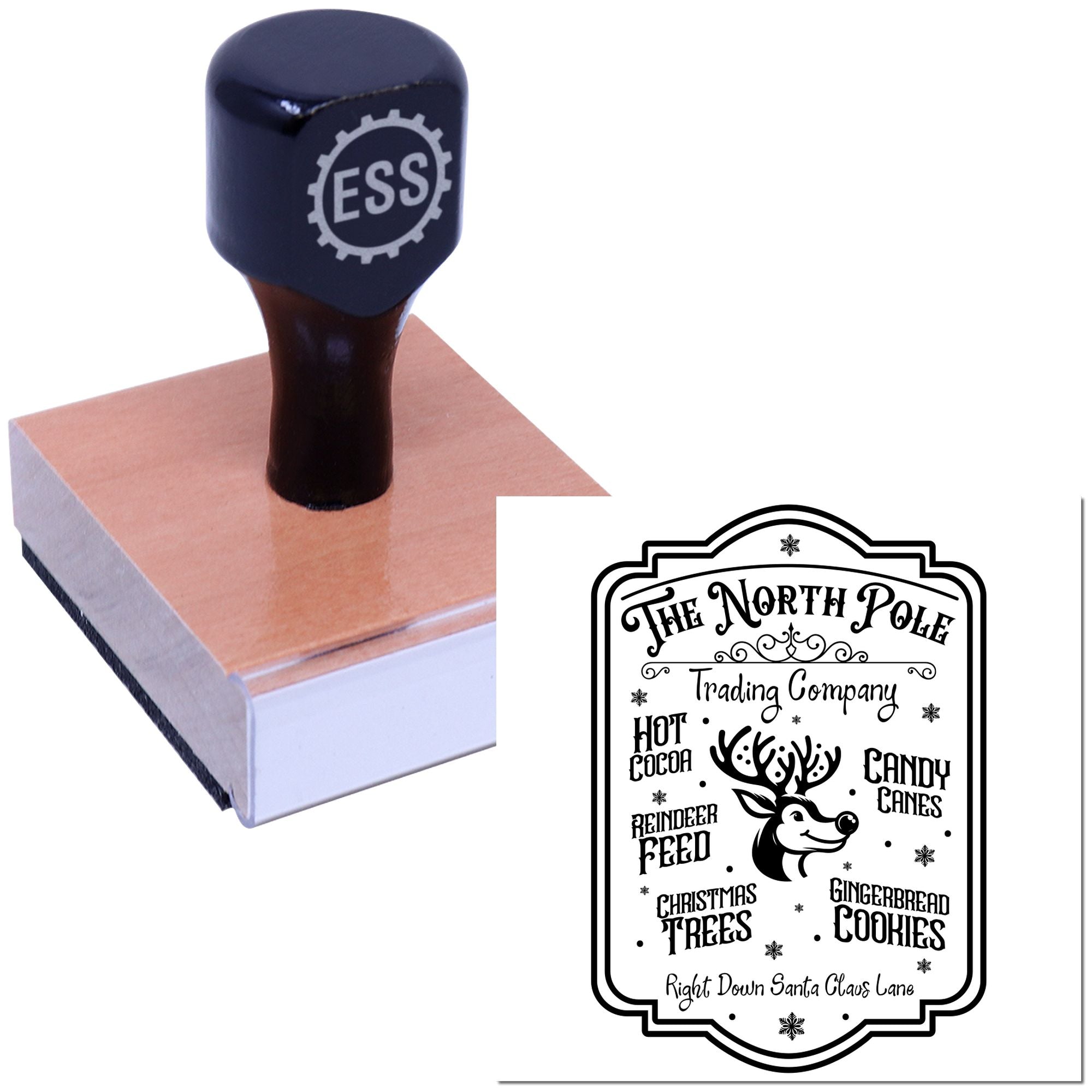 Black rubber stamp and seal with ESS logo on tan block, showing a festive black reindeer logo impression sample.