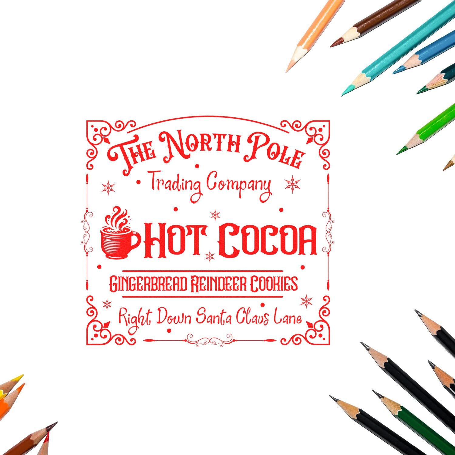 Red decorative holiday stamp seal with The North Pole Trading Company hot cocoa text, framed by colored pencils on white background