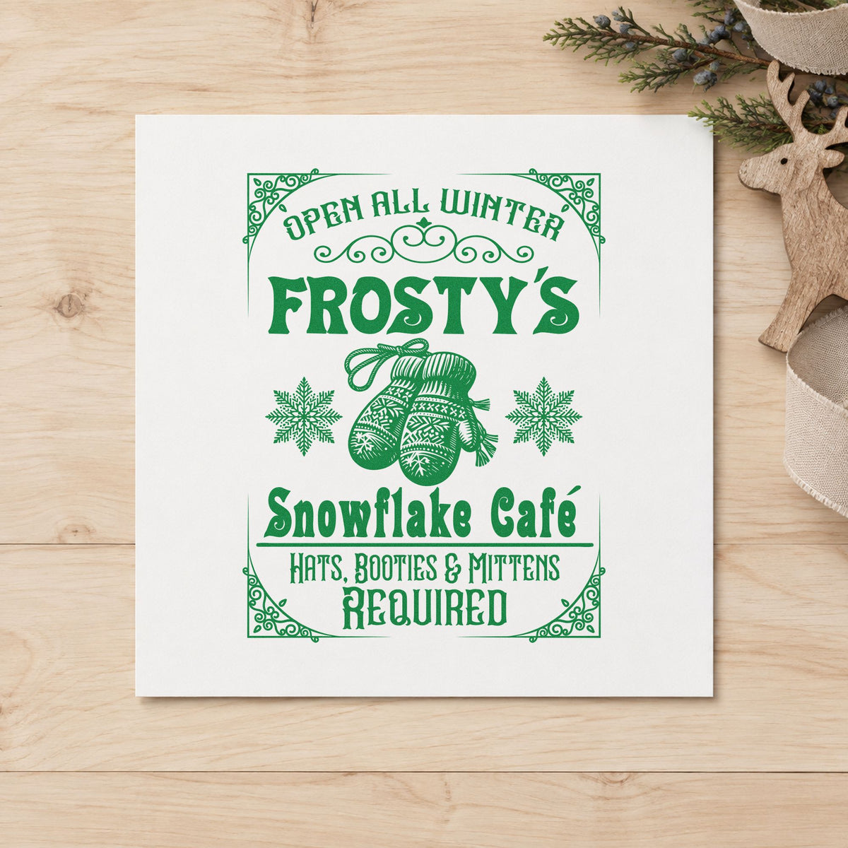 Frosty's Snowflake Cafe Sign craft stamp imprint in green ink on a handmade project, one idea being winter menu cards.