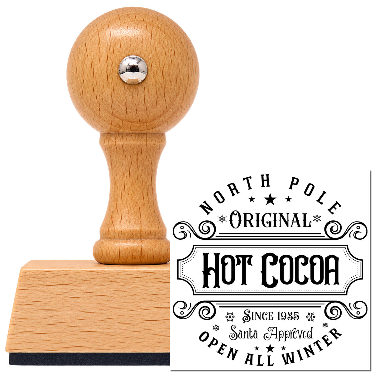 Vintage Pro beech wood stamp with a round knob handle, shown with its black North Pole Original Hot Cocoa imprint on white.