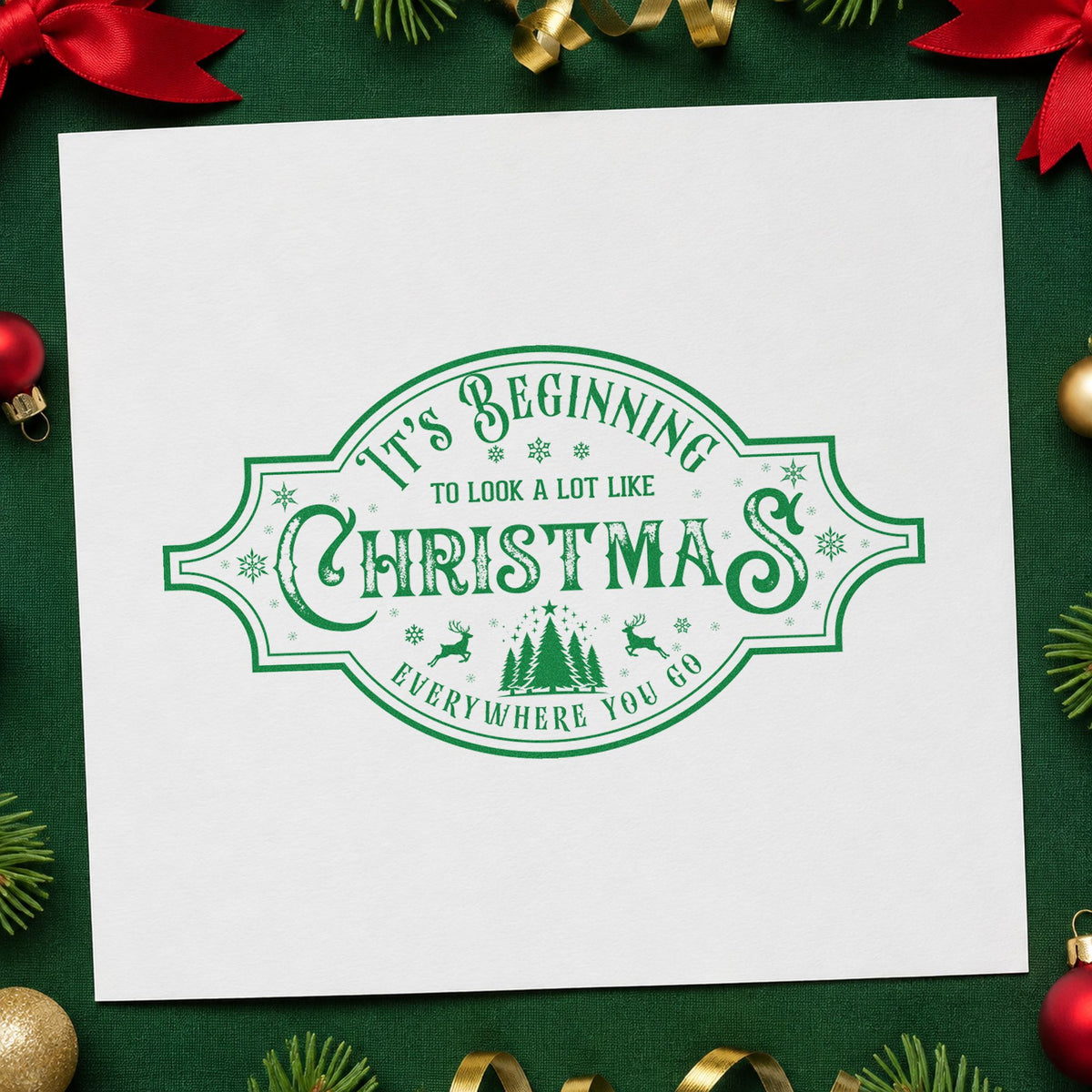 Beginning To Look Like Christmas craft stamp imprint in green ink on a handmade project, one idea being trim party cards.