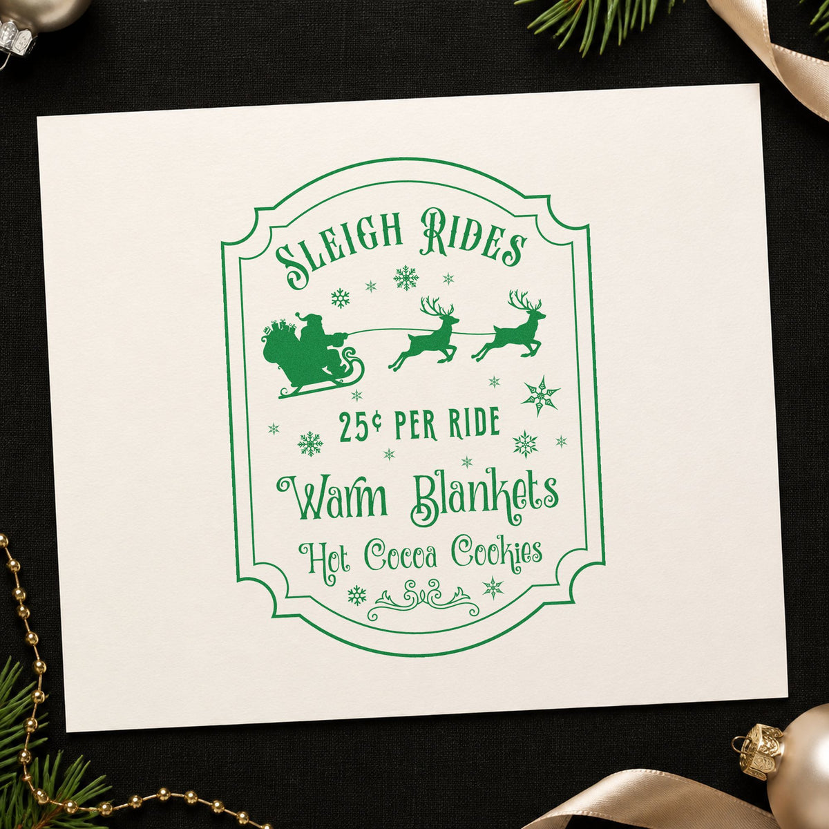 Sleigh Rides Warm Blankets craft stamp imprinted in green ink on paper, a design suited to framed ticket window.