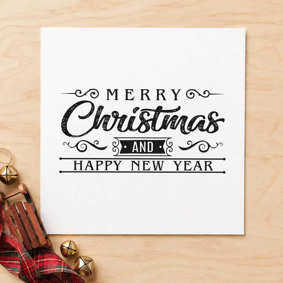 Merry Christmas Happy New Year craft stamp imprint in black ink on a handmade project, one idea being late send gift tags.