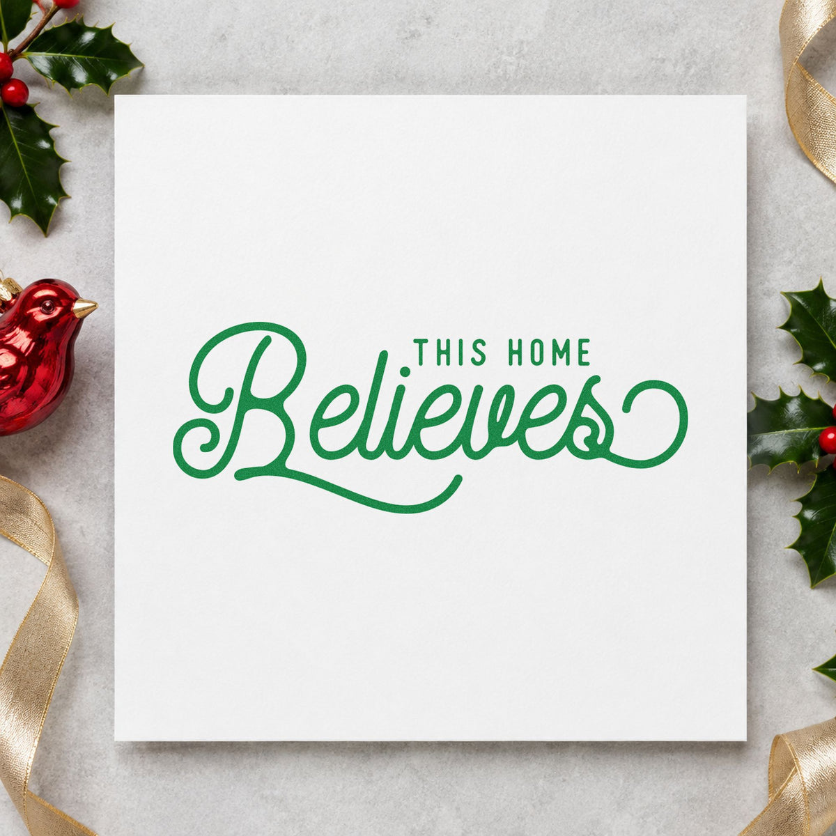 This Home Believes Script craft stamp imprint in green ink on a handmade project, one idea being neighbor note cards.