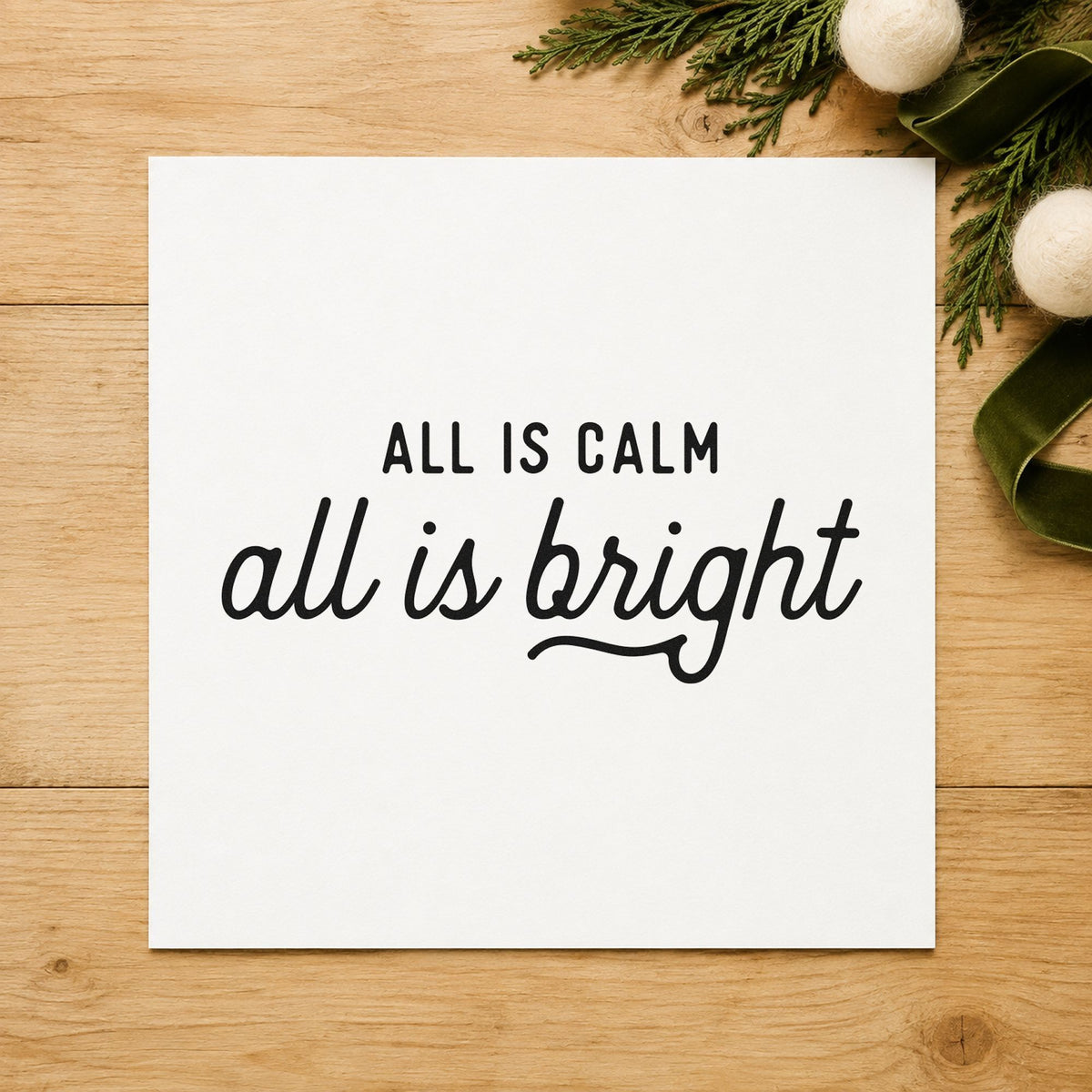 All Calm All Bright Script craft stamp imprint in black ink on a handmade project, one idea being candle gift tags.