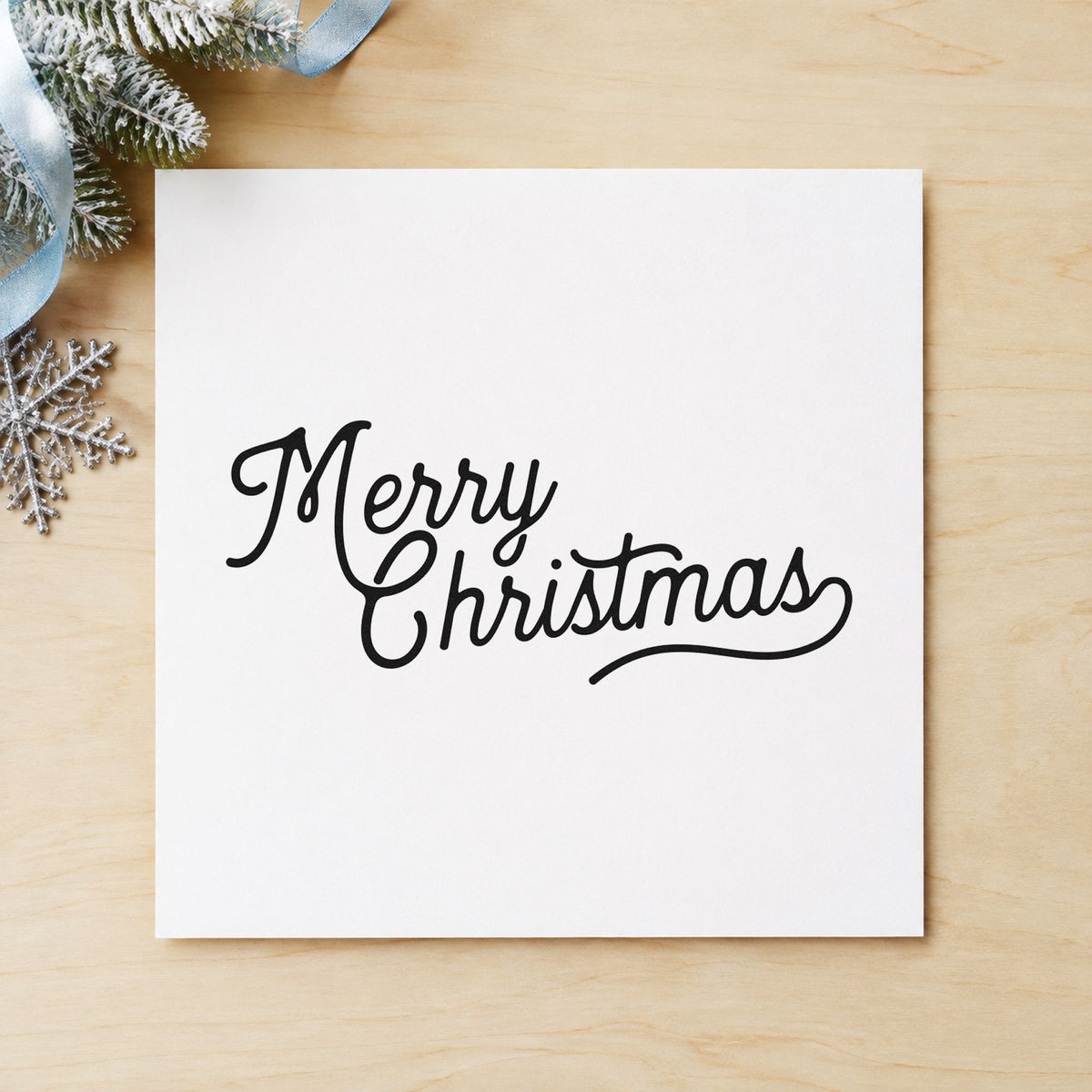 Merry Christmas Script Greeting craft stamp imprint in black ink on a handmade project, one idea being single stroke tags.