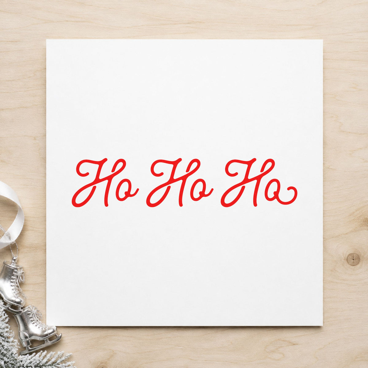 Ho Ho Ho Script craft stamp in red ink on cardstock, an easy option for cuff band printing.
