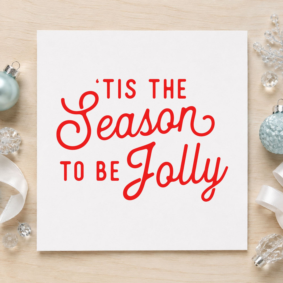 Tis The Season Jolly Script rubber stamp shown in red ink, stamped for projects such as mason jar labels.