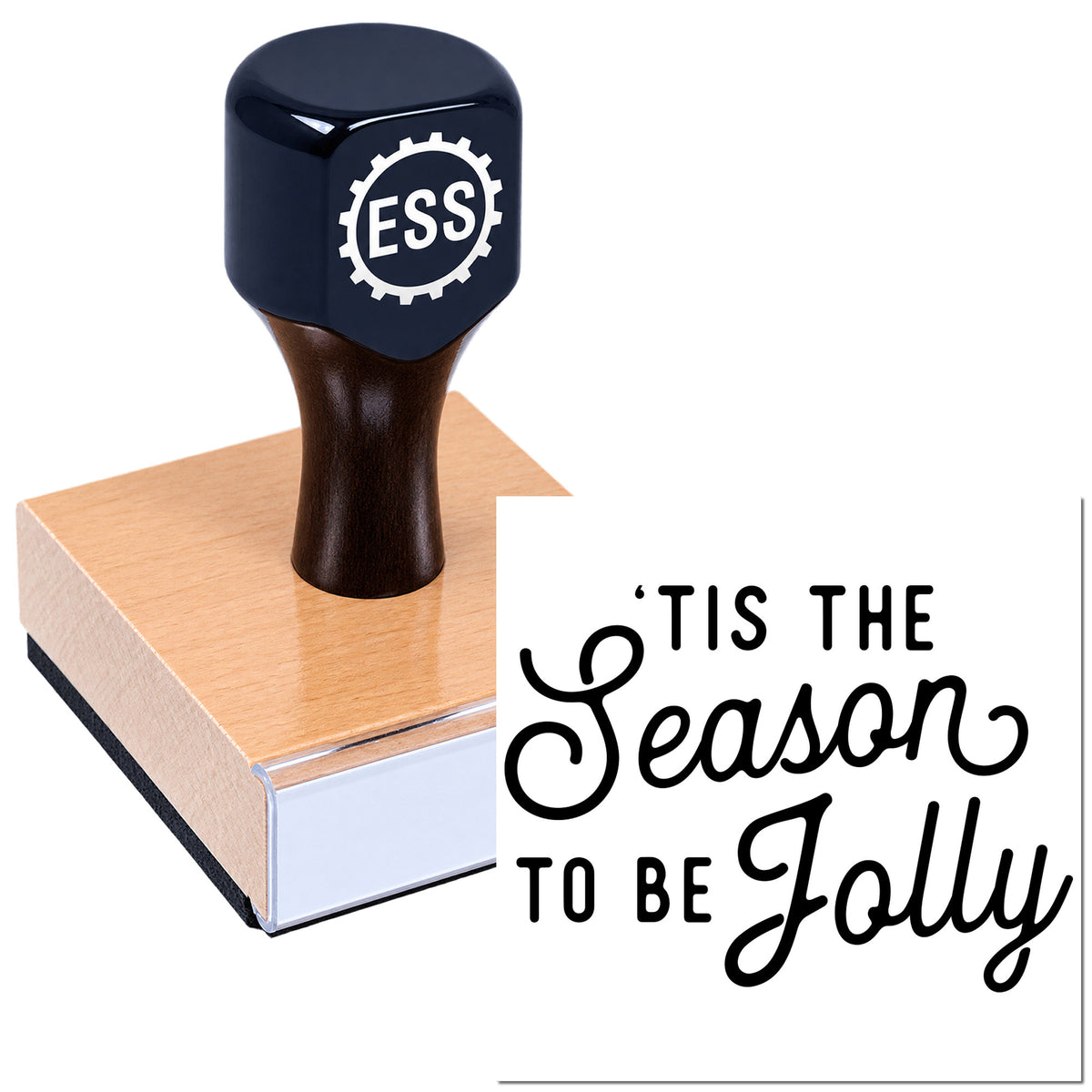 Black ESS stamp and seal on a peach wood block, beside a white card reading "'Tis the Season to be Jolly."