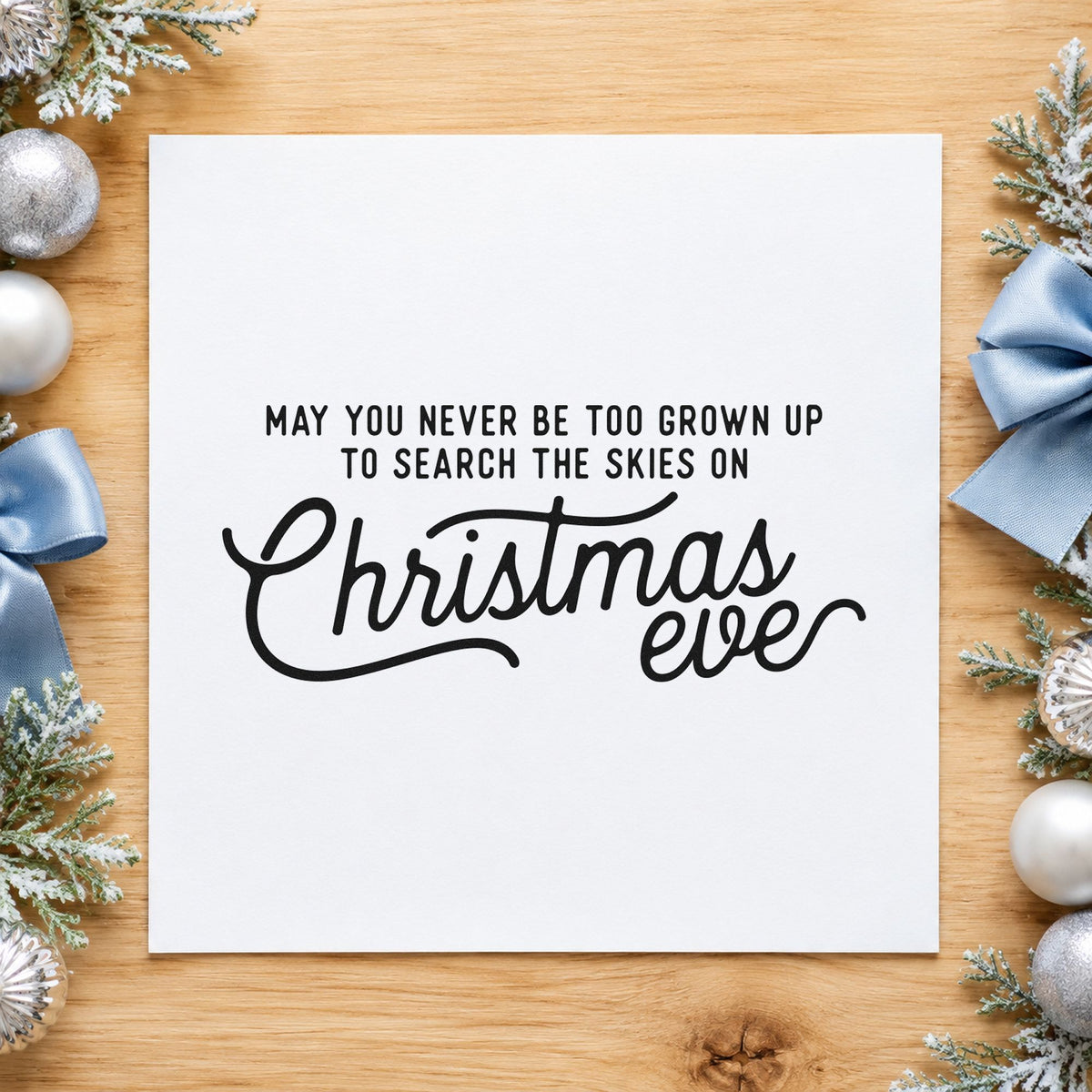 Never Grown Up Christmas Eve craft stamp imprint in black ink on a handmade project, one idea being star chart gift tags.