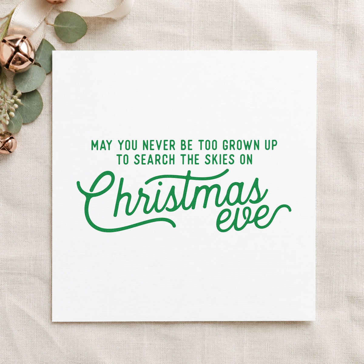 Never Grown Up Christmas Eve craft stamp imprinted in green ink on paper, a design suited to framed ceiling view.
