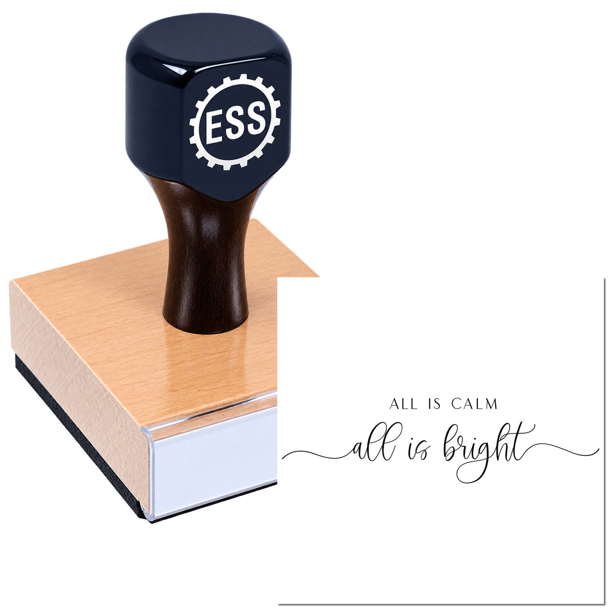 Navy and black ESSI rubber stamp on copper-pink seal block beside white card reading "All is calm, all is bright."