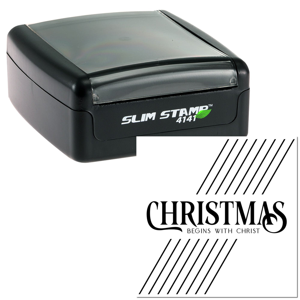 Black slim self-inking stamp with white Christmas seal reading Christmas Begins with Christ, black diagonal lines, green accent.