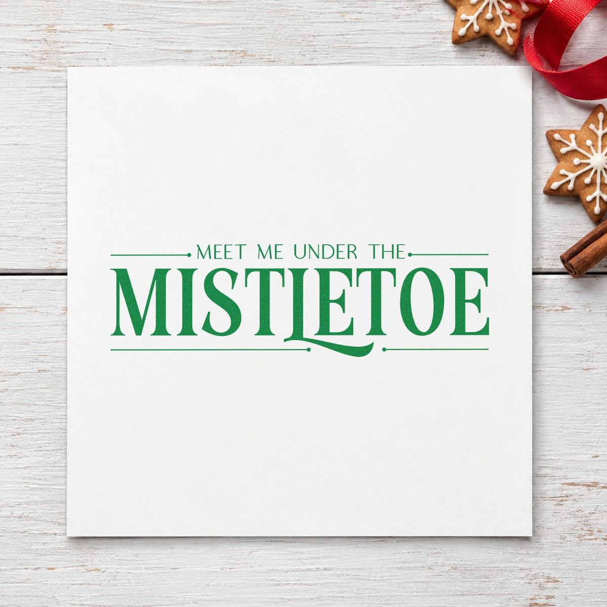 Meet Me Under The Mistletoe craft stamp imprinted in green ink on paper, a design suited to framed sample board.