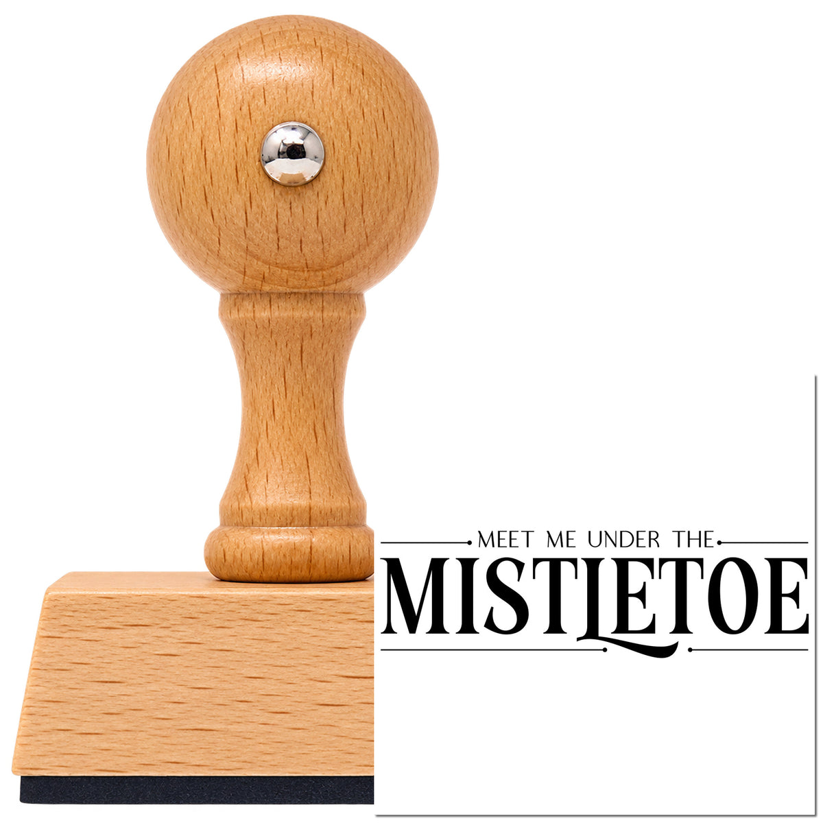Vintage Pro beech wood stamp with a round knob handle, shown with its black Meet Me Under The Mistletoe imprint on white.