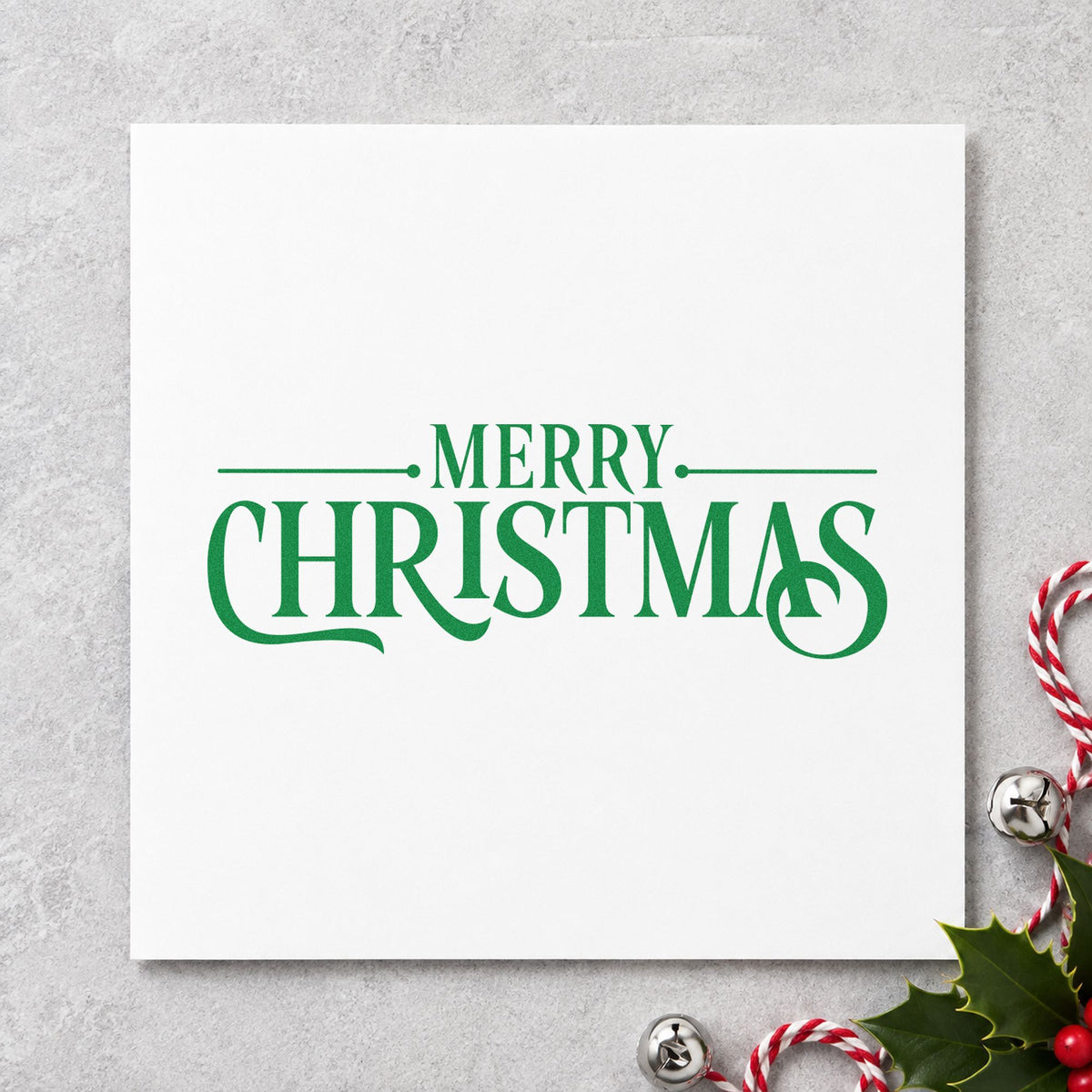 Merry Christmas Decorative Serif craft stamp in green ink on cardstock, an easy option for press proof album.