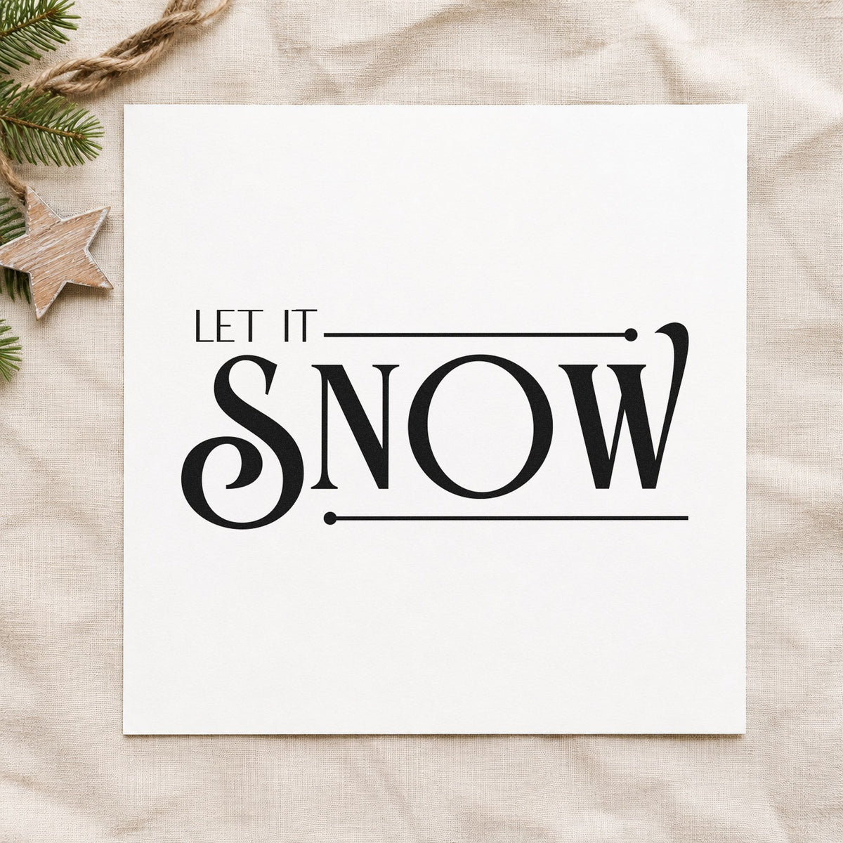 Let It Snow Serif craft stamp imprint in black ink on a handmade project, one idea being boutique hang tags.