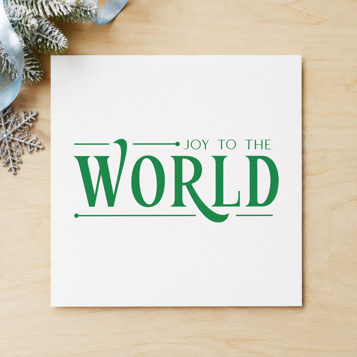 Joy To The World Serif craft stamp in green ink on cardstock, an easy option for closing album page.