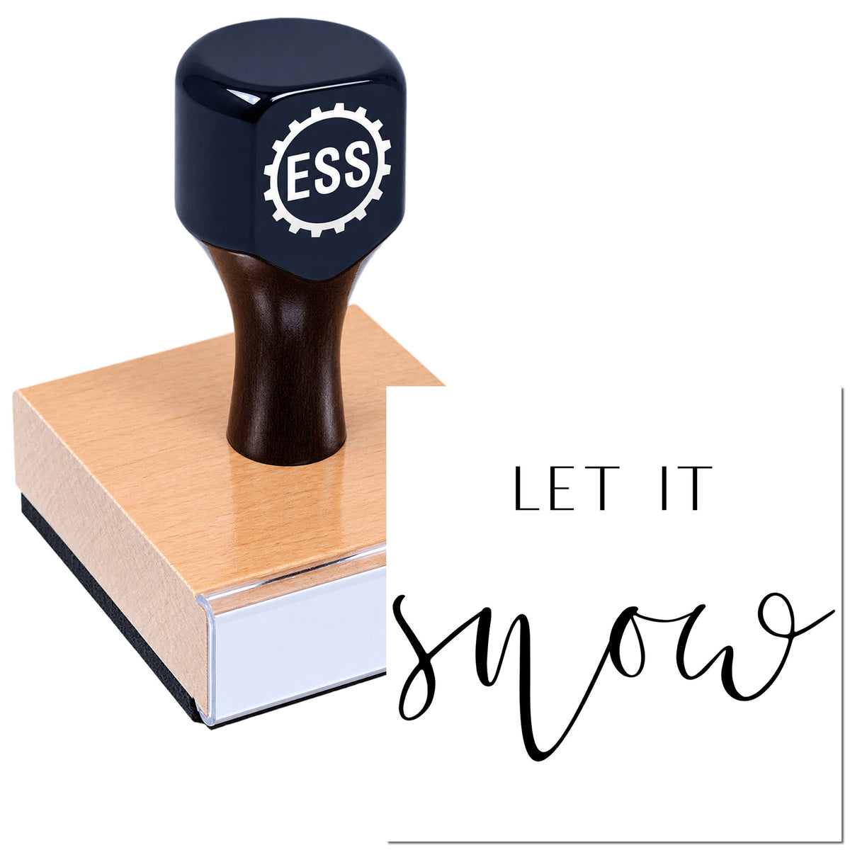 Navy self-inking ESS stamp and seal on copper base beside white card reading "LET IT" in black script