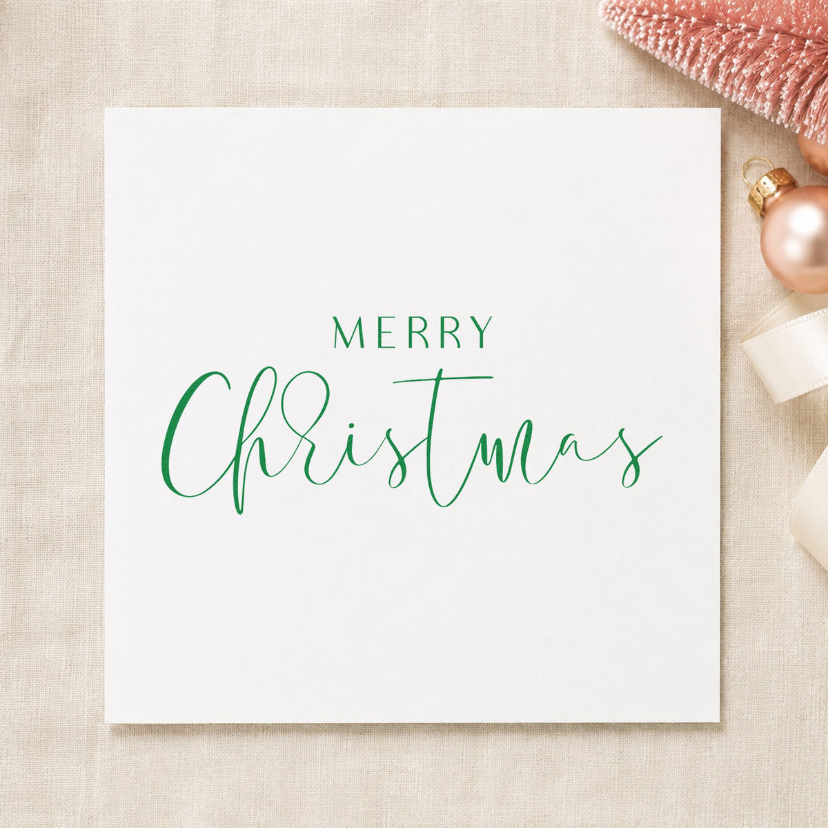 Merry Christmas Fine Script craft stamp in purple ink on cardstock, an easy option for wedding album plate.