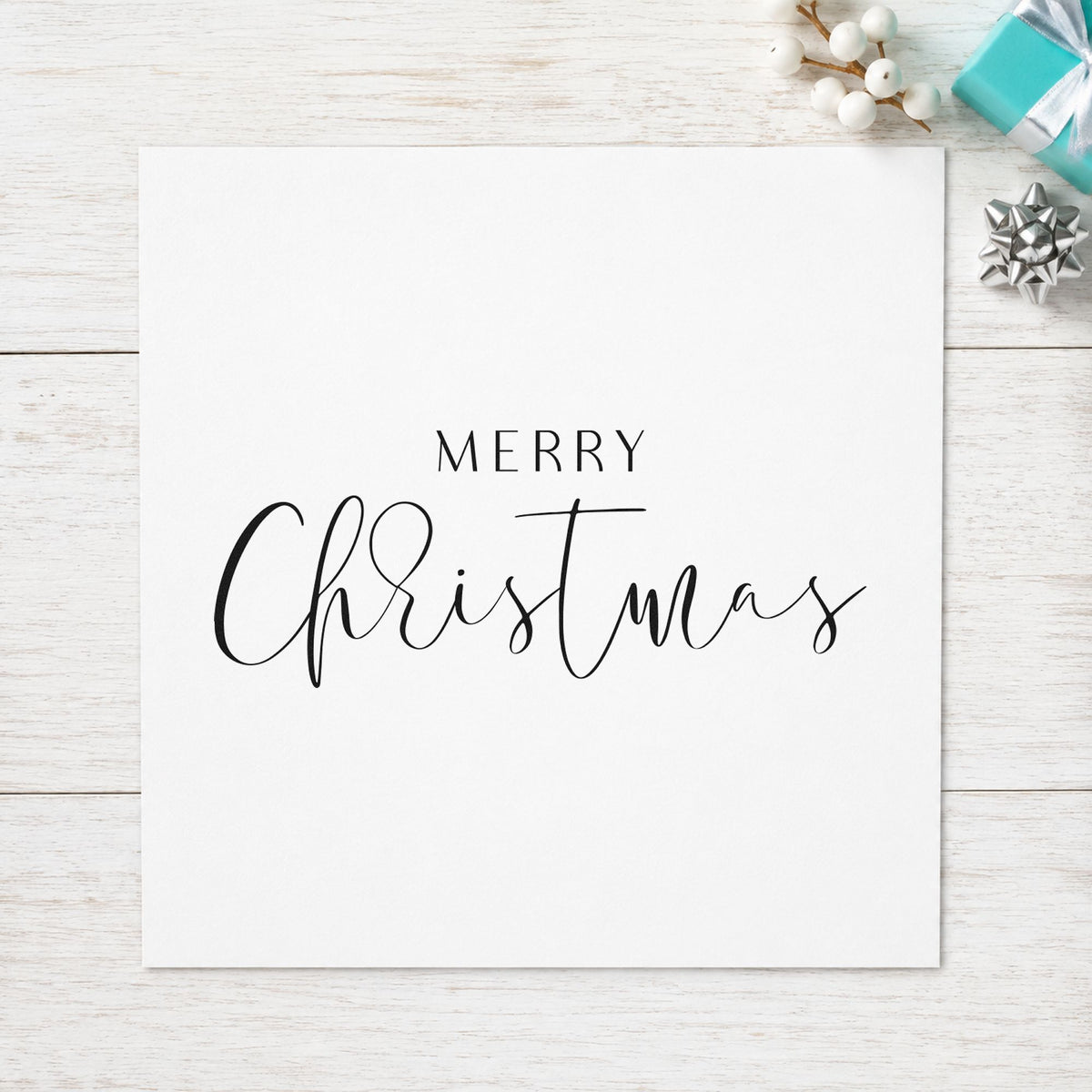 Merry Christmas Fine Script rubber stamp printed in black ink, ready for spaced caps cards and similar paper crafts.