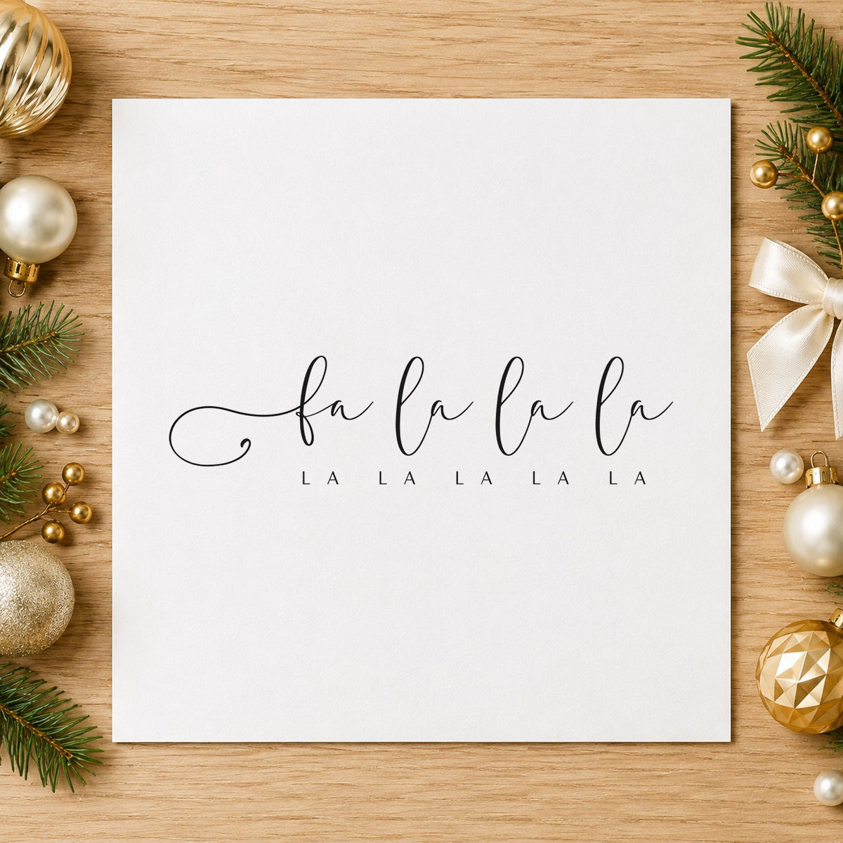 Fa La La Holiday Script craft stamp imprint in black ink on a handmade project, one idea being songsheet clip tags.
