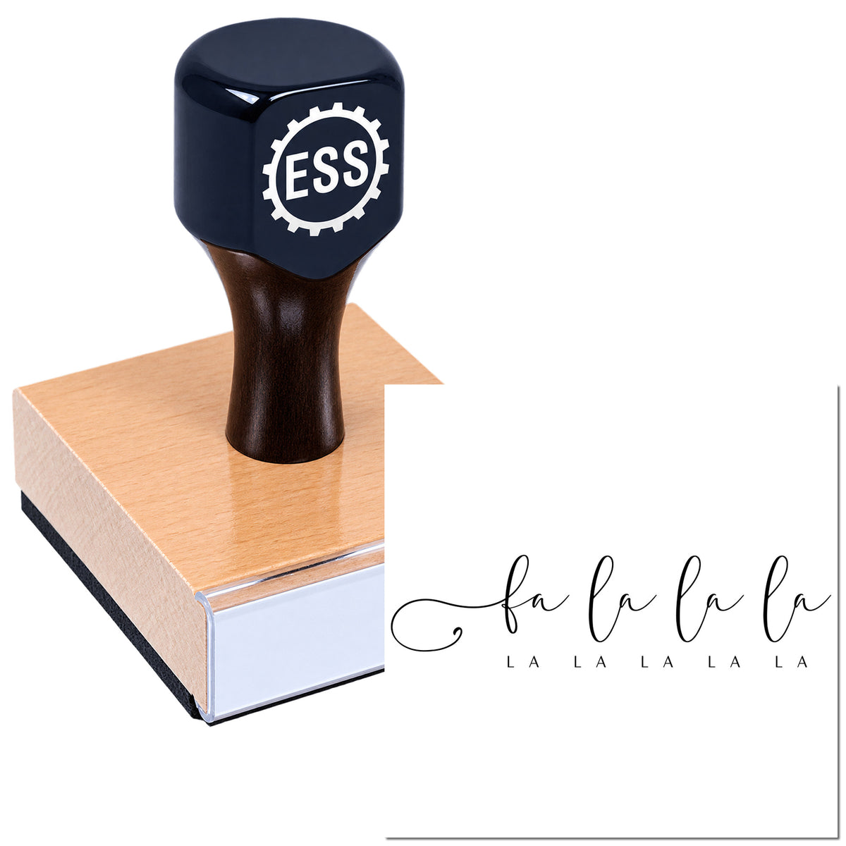 Dark navy ESS stamp and seal with wooden handle, copper base, and white packaging labeled "fa la la la".