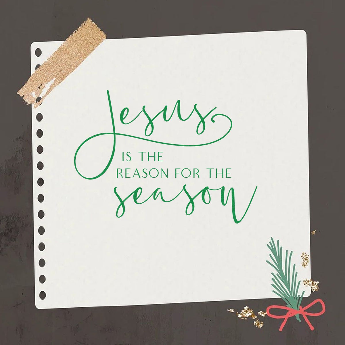 Stamp and seal sample: white card with green Jesus is the reason for the season text, tan tape, black holes, pine sprig, and red bow.